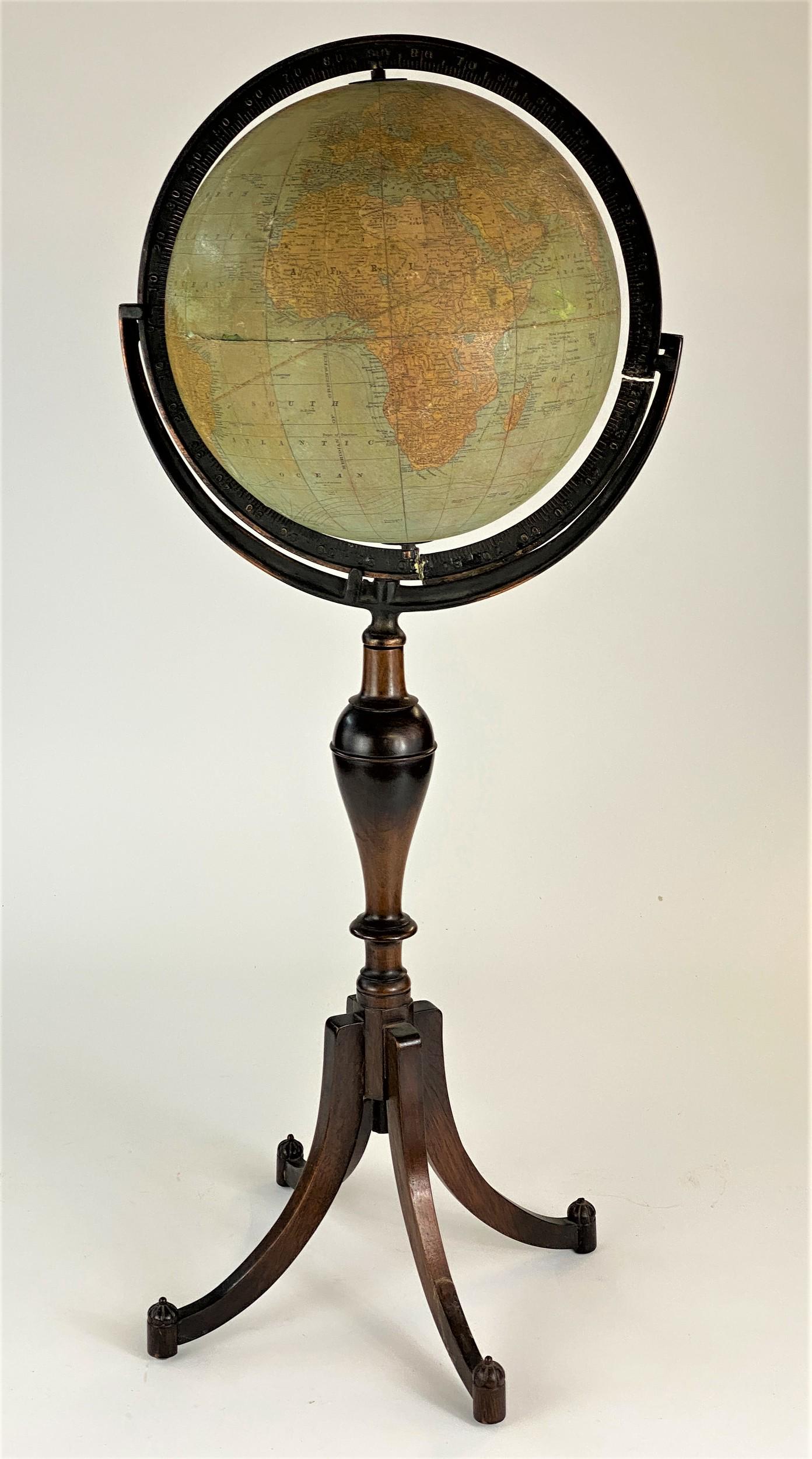 Rand McNally 12" Globe on Stand: Early 20th century, a terrestrial globe on stand; ht. 37".