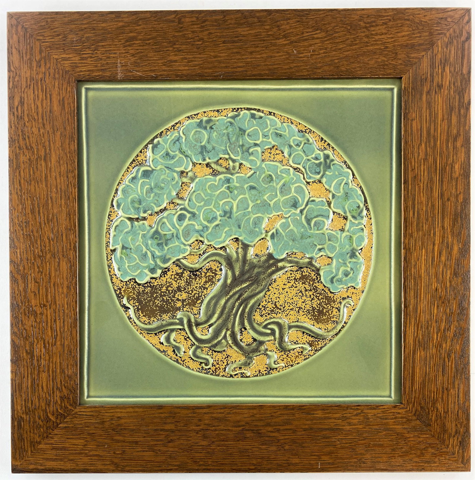Contemporary Rookwood Pottery "Tree of Life" Pottery: A contemporary Rookwood Pottery Co. plaque, in Arts & Crafts style oak frame; 16.75" ht. x 16.75" wd.(framed).