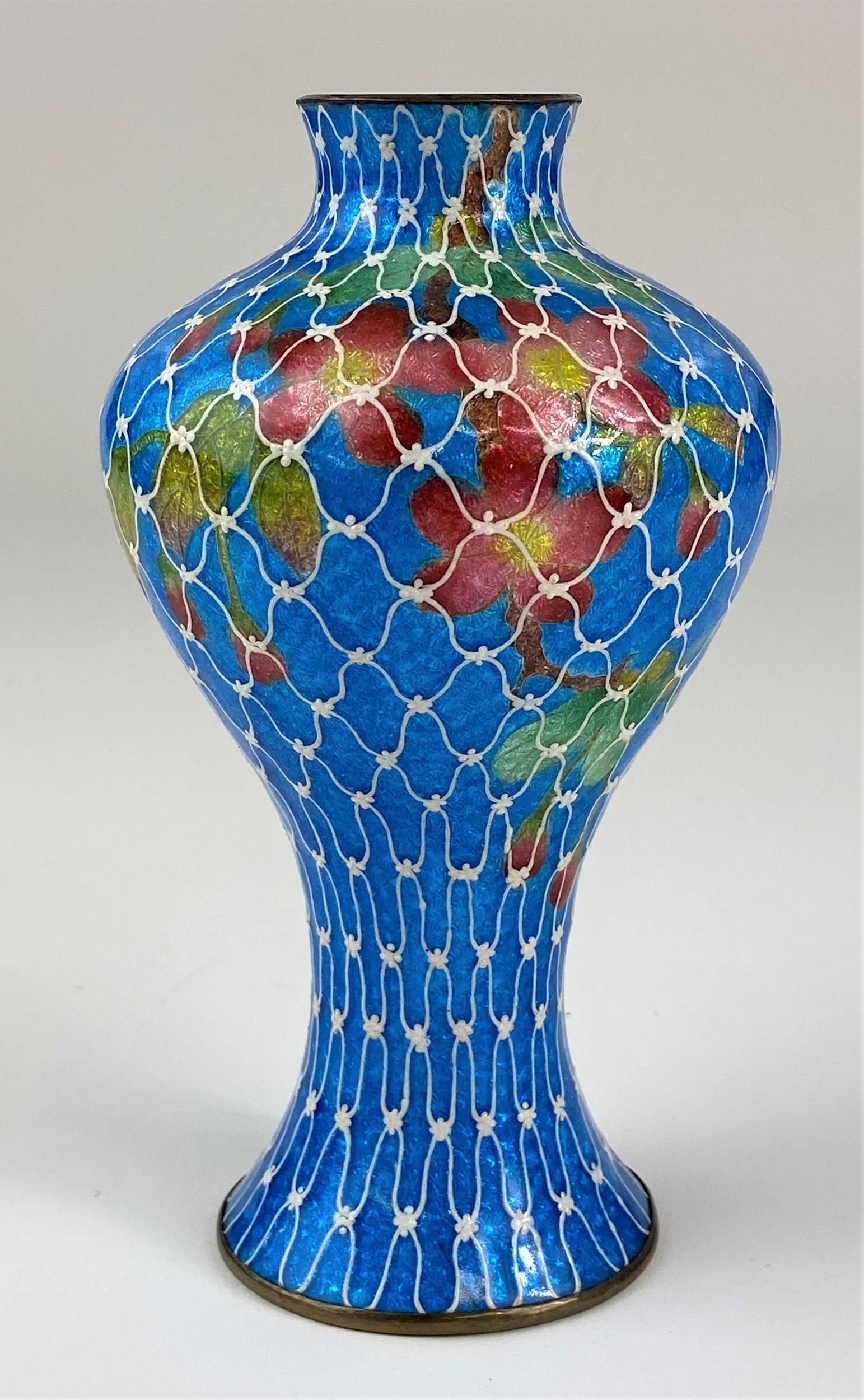 Japanese Cloisonne Ginbari Vase with Net and Floral: A Japanese ginbari cloisonné vase, globular form, with fine enamel net design to exterior, revealing silver foil and enamel underneath, mountain design circular mark to underside; ht. 6".