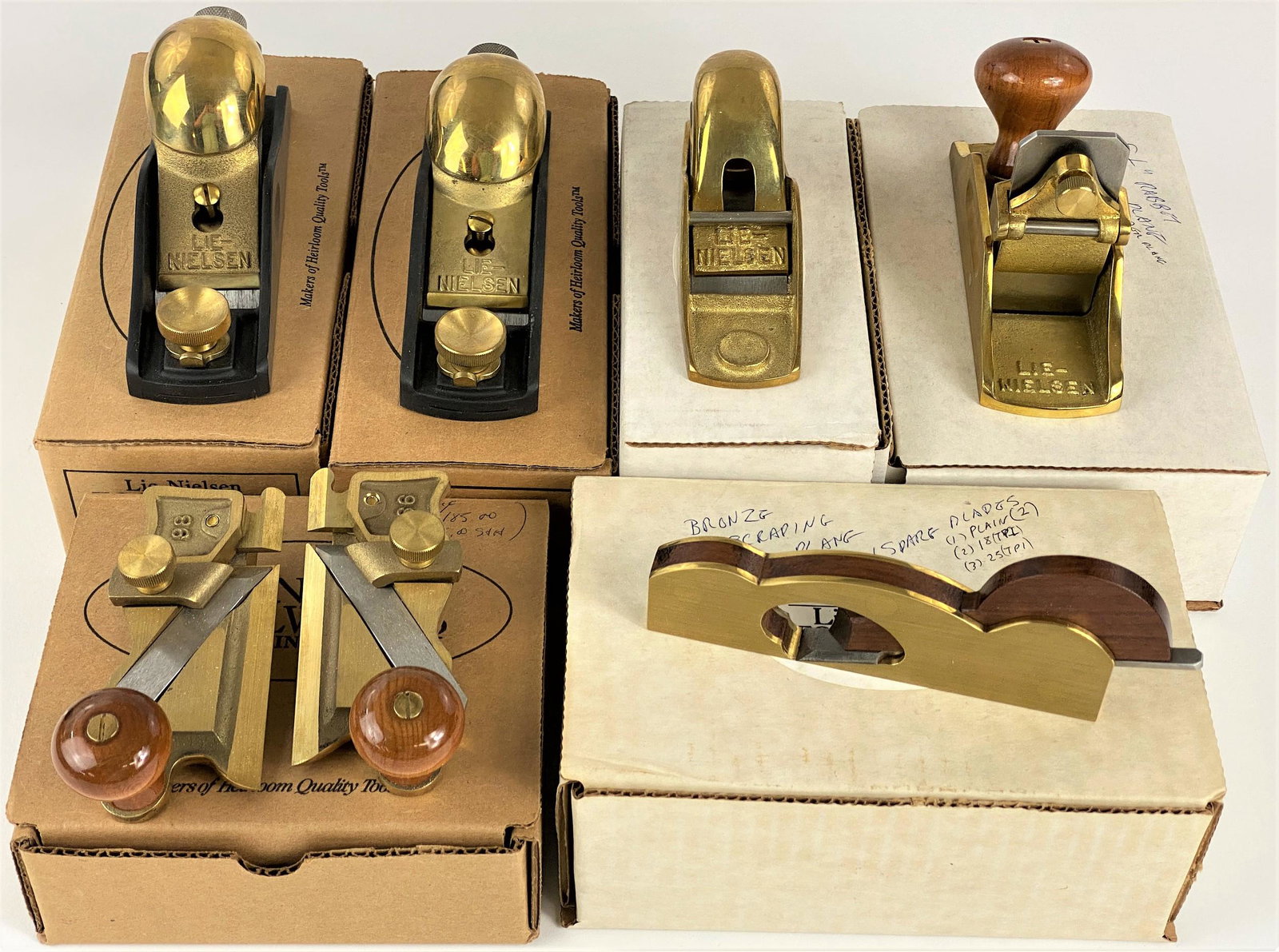 Lot of Lie-Nielsen Planes and Scrapers: A great group of six planes and scrapers including L-N 60 1/2, L-N 9-1/2, the 1/2" rabbit, the bronze scraping plane, the pair of L-N 98/99, and finally a low angle block plane with extra blade.