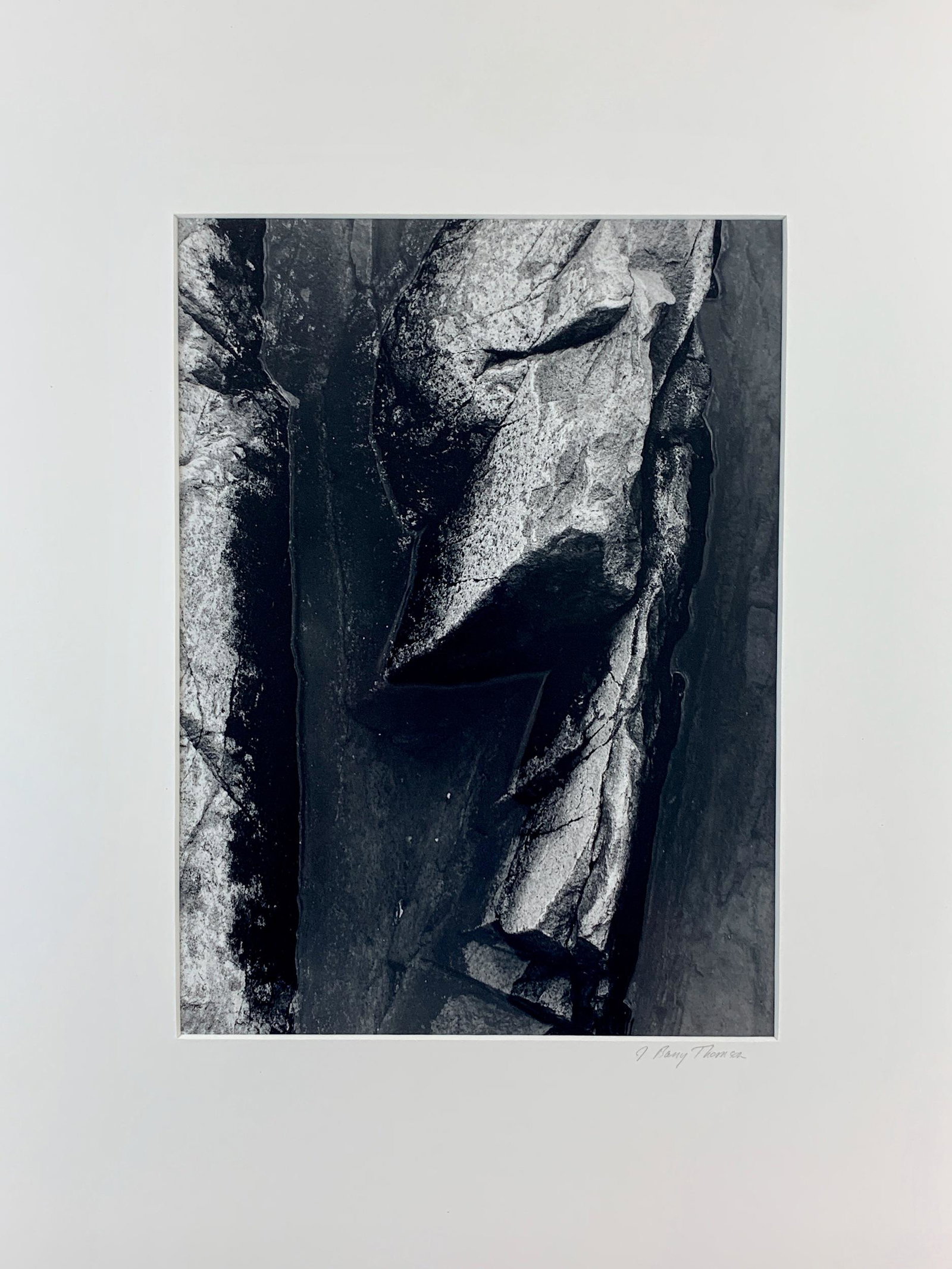 J. Barry Thompson (American, b. 1948), Photograph: A silver gelatin photograph, mounted to backing, depicting a canyon view from above, signed l.r. backing; 11.5" x 9" (sight), 20" x 16" (stock).