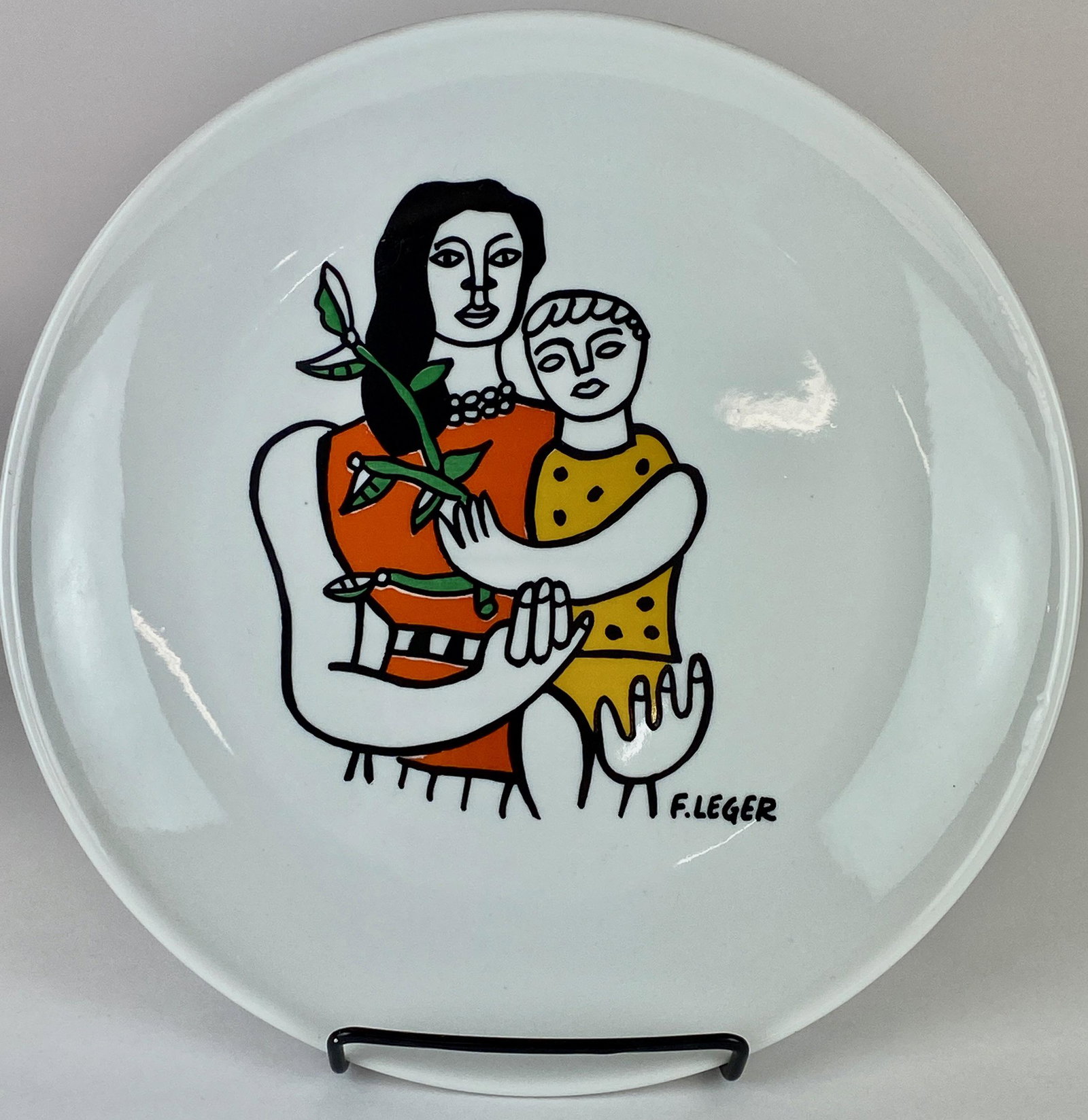 Limited Edition Ferdinand Leger Plate: Porcelain, marked to underside; diameter 9.5". From the Estate of Harold and Miriam Prigozen, Dayton, OH.