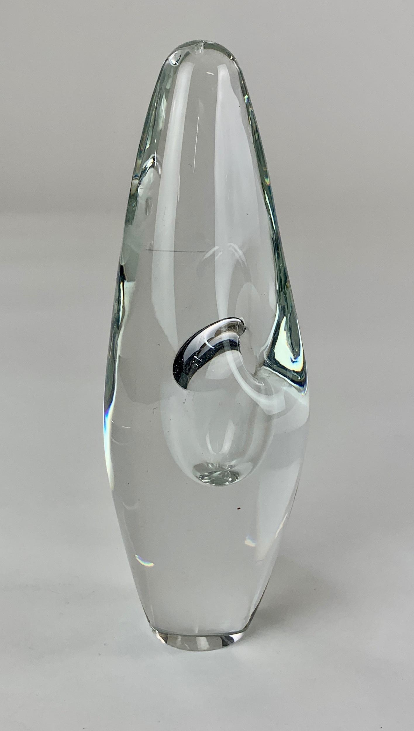 Timo Sarpaneva Artglass Paperweight: Handblown example from Timo Sarpaneva (Finnish, 1926-2006), an elongated weight with small hole to the side leading to interior cavity. Signed and numbered by the artist on the bottom. Ht. 6.25" From