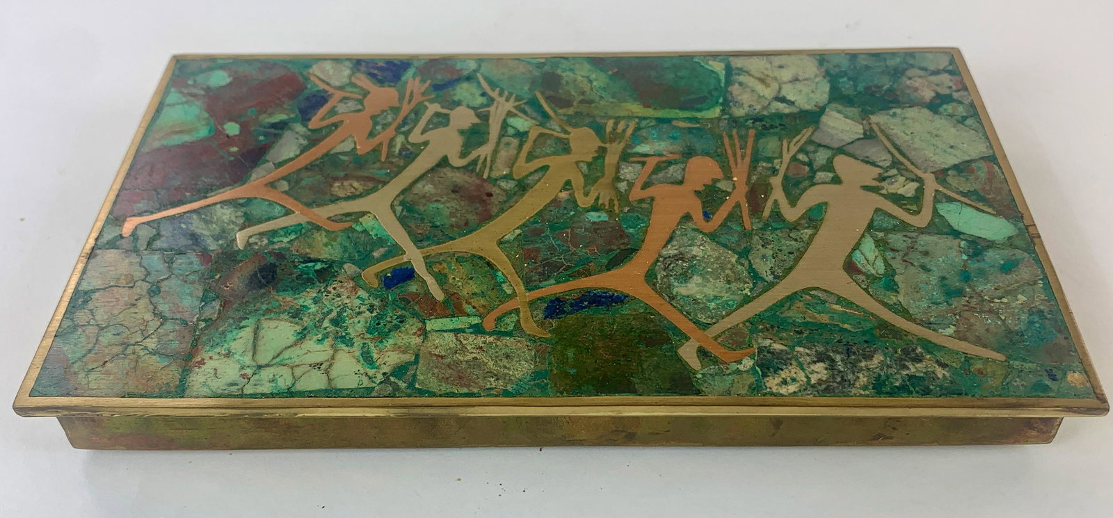 Mexican Brass and Stone Box: A cigarette box with inlay brass and stone; 8" x 4.5" From the Estate of Harold and Miriam Prigozen, Dayton, OH.