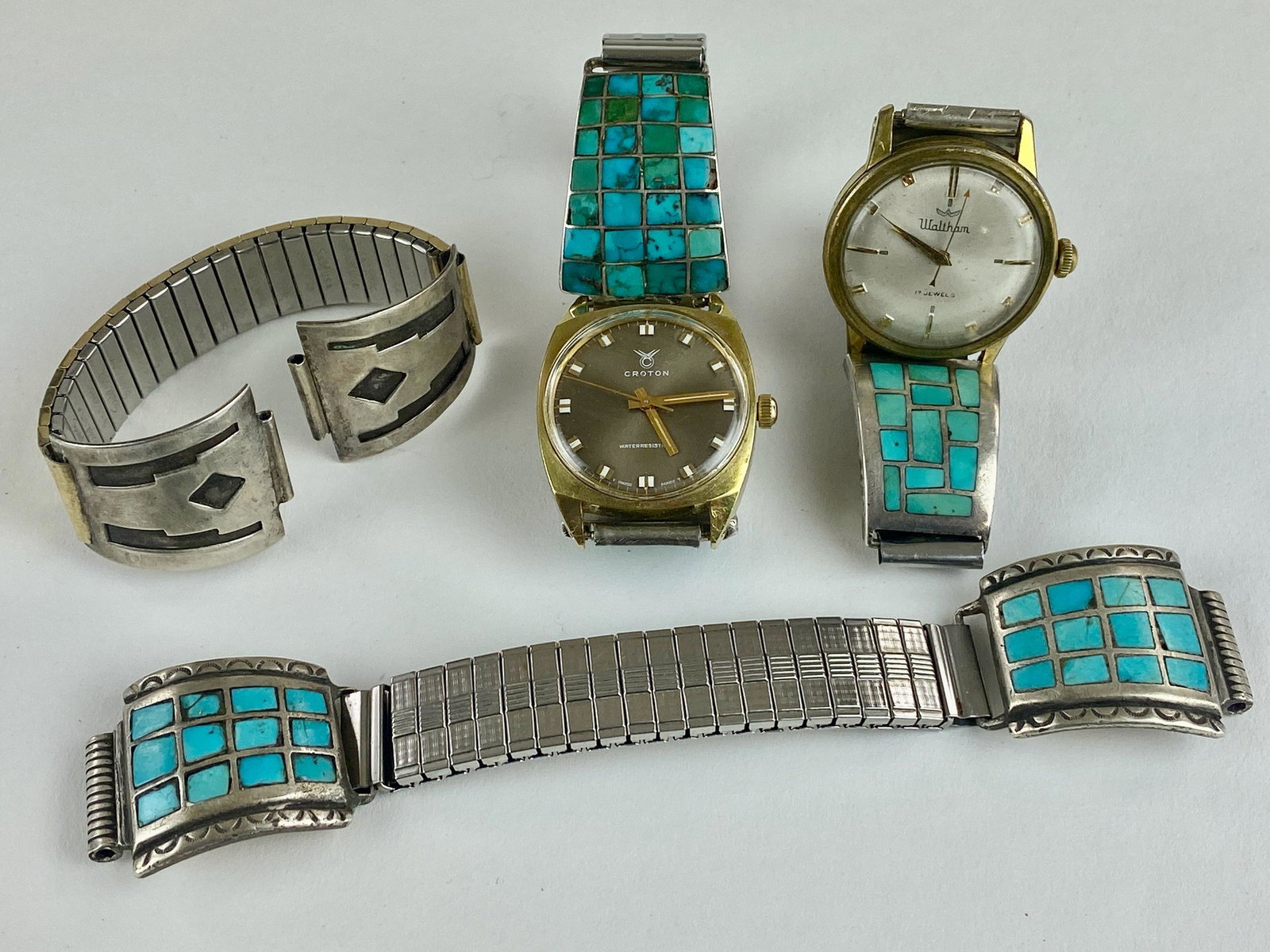 Group of Wrist Watches and Southwestern Bands: A pair of wrist watches, Waltham and Croton, each with turquoise inlayed bands, one of which is marked for Carlos Diaz, and a pair of Southwestern watch bands.
