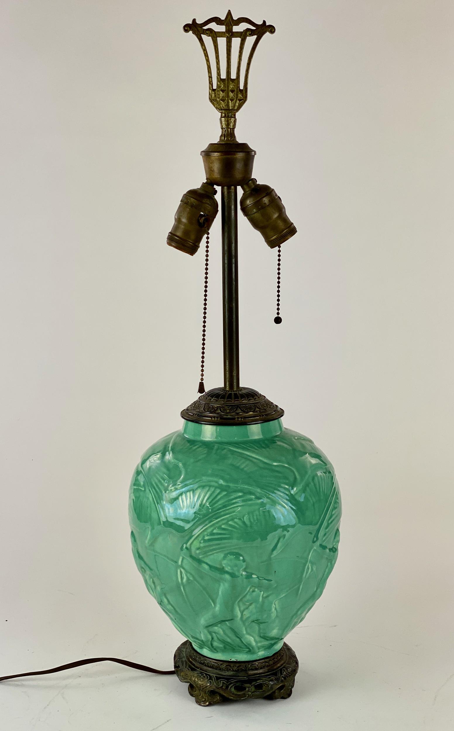 Art Deco Stangl / Fulper "ARCHERS" Pottery Table Lamp: A porcelain lamp with Art Deco Native American scenes in the surround. Ht. 26".