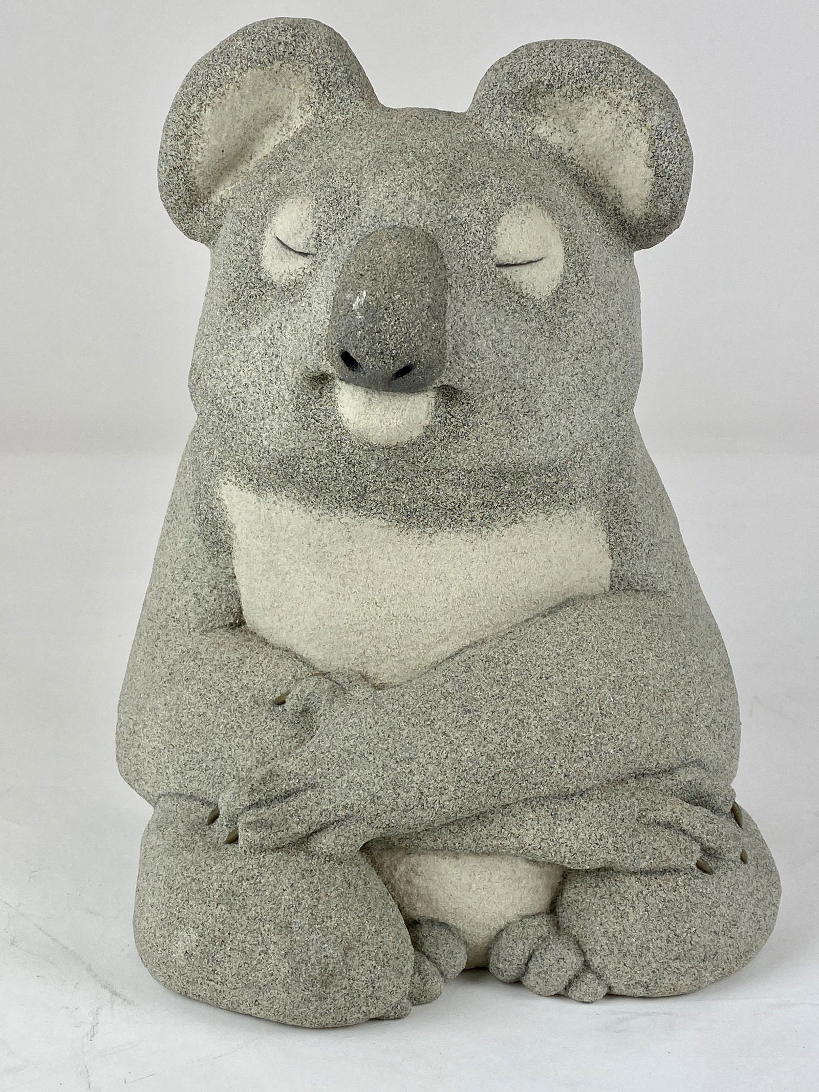 Lou Rankin Concrete Koala Bear Sculpture: Lou Rankin (American, 1929-2016), Depicting a koala bear sitting up with eyes closed. 12" ht.