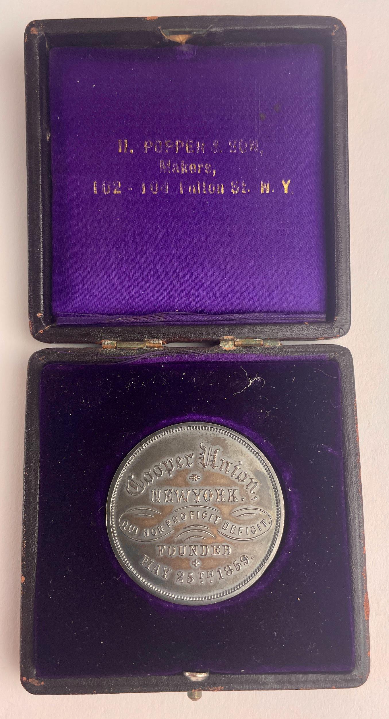 Cooper Union Silver Medal for Still Life Painting: A late 19th century sterling medal, in original box, awarded to Genevieve Lane for still life oil painting, the medal having engraving to front and struck on both sides.