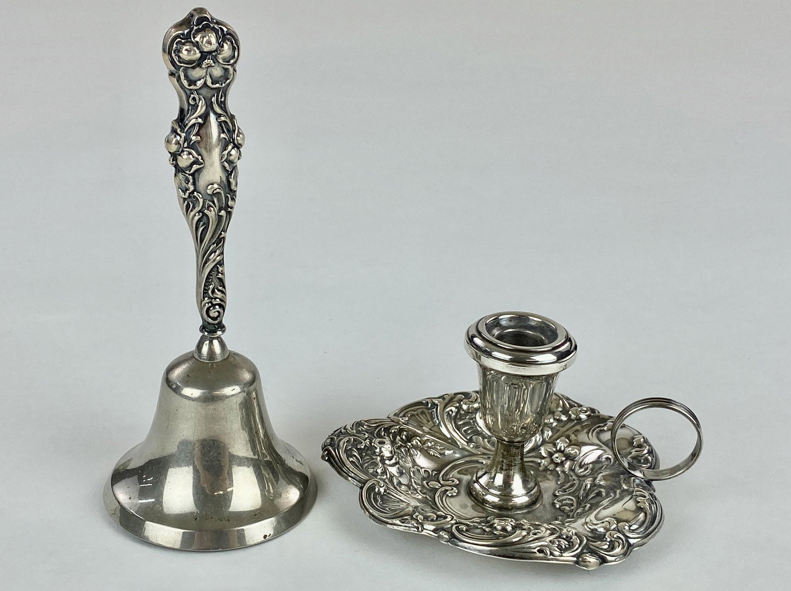 Gorham Sterling Bell and Candle Holder: A service bell and candle holder, the bell with only handle sterling, the candle all sterling, each marked. Ht of tallest 5.5".