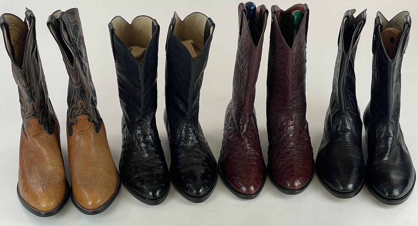 4 Pairs of Leather Boots Including Tony Lama: Including three pairs of leather boots that are unidentified, and one labeled Tony Lama pair. One is marked "Size 11" -- all appear to be the same size.