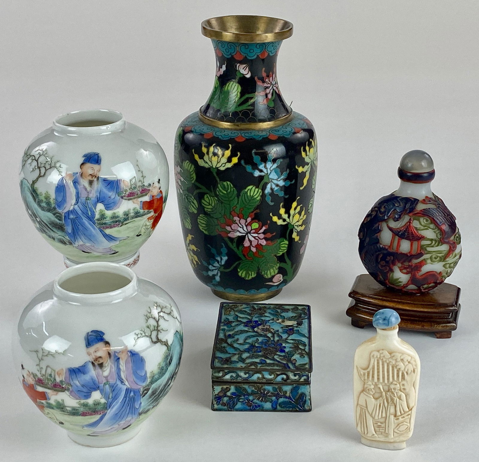 Chinese Porcelain and Other Articles: Including a cloisonne vase, a finely enameled box, a pair of porcelain globes for candles, finely decorated to reveal children and teachers, one with a stand, the other missing, a Peking glass snuff b