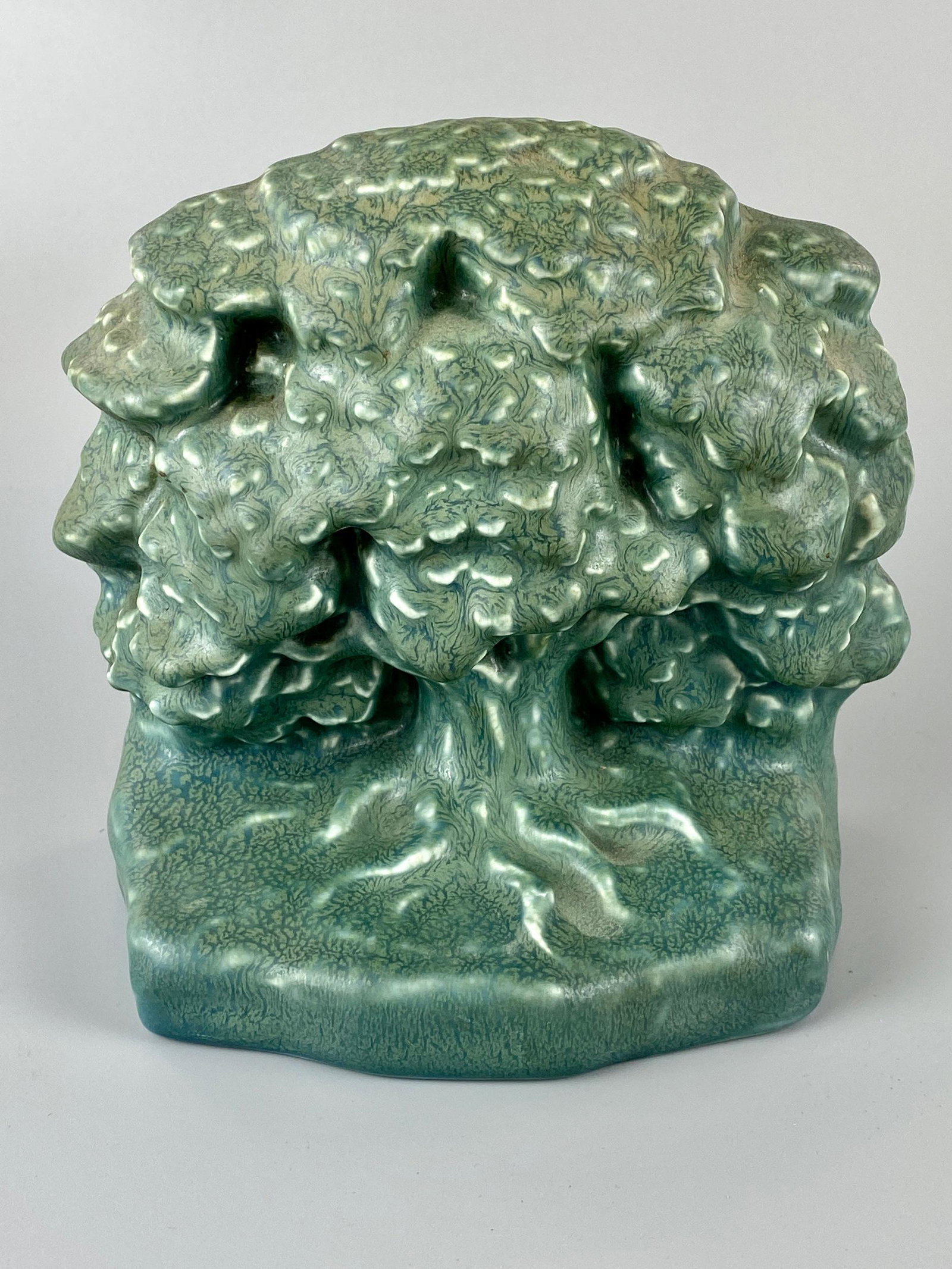 Rookwood Pottery Tree of Life Bookend: A single bookend in matte dark green glaze, Height 6.25"