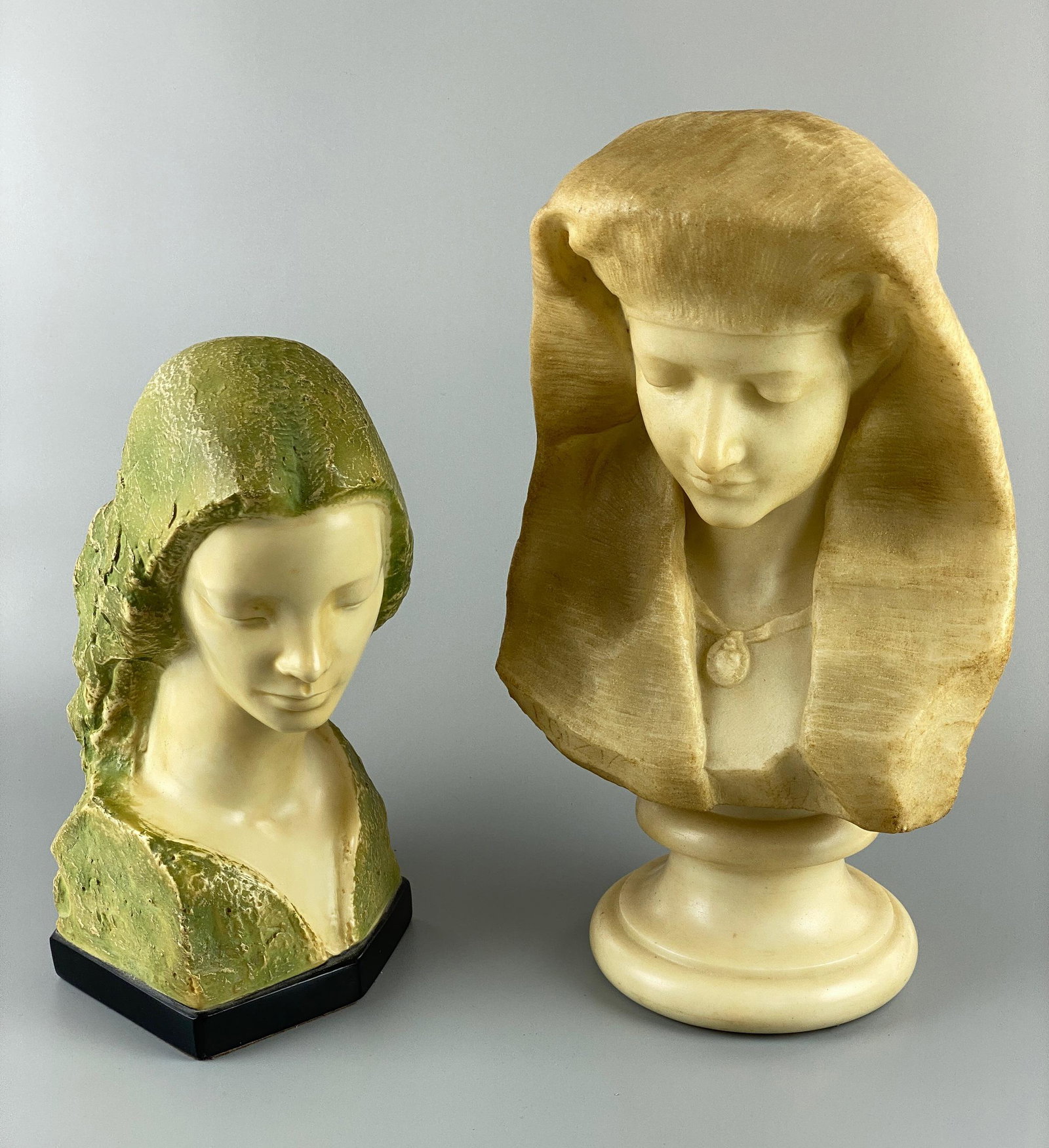 Pair of Busts by Glinsky and Egizia: Including an alabaster bust of a woman with cameo, and another bust in resin signed V. Glinsky. Tallest ht. 14".