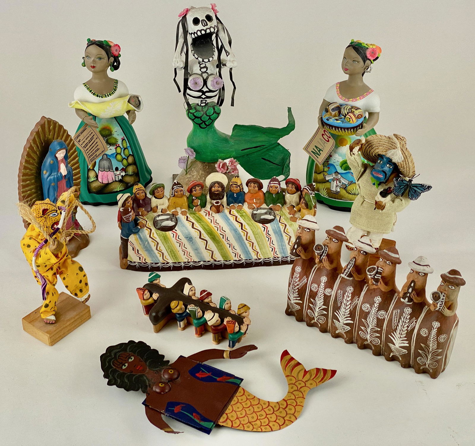 Group of Mexican and Southwestern Figures: Pottery, papier mache and other mediums, a group of 10 figural groups. Tallest ht. 11". From the collection of Dr. Gerald and Barbara Theisen, of Georgetown, KY and New Mexico.