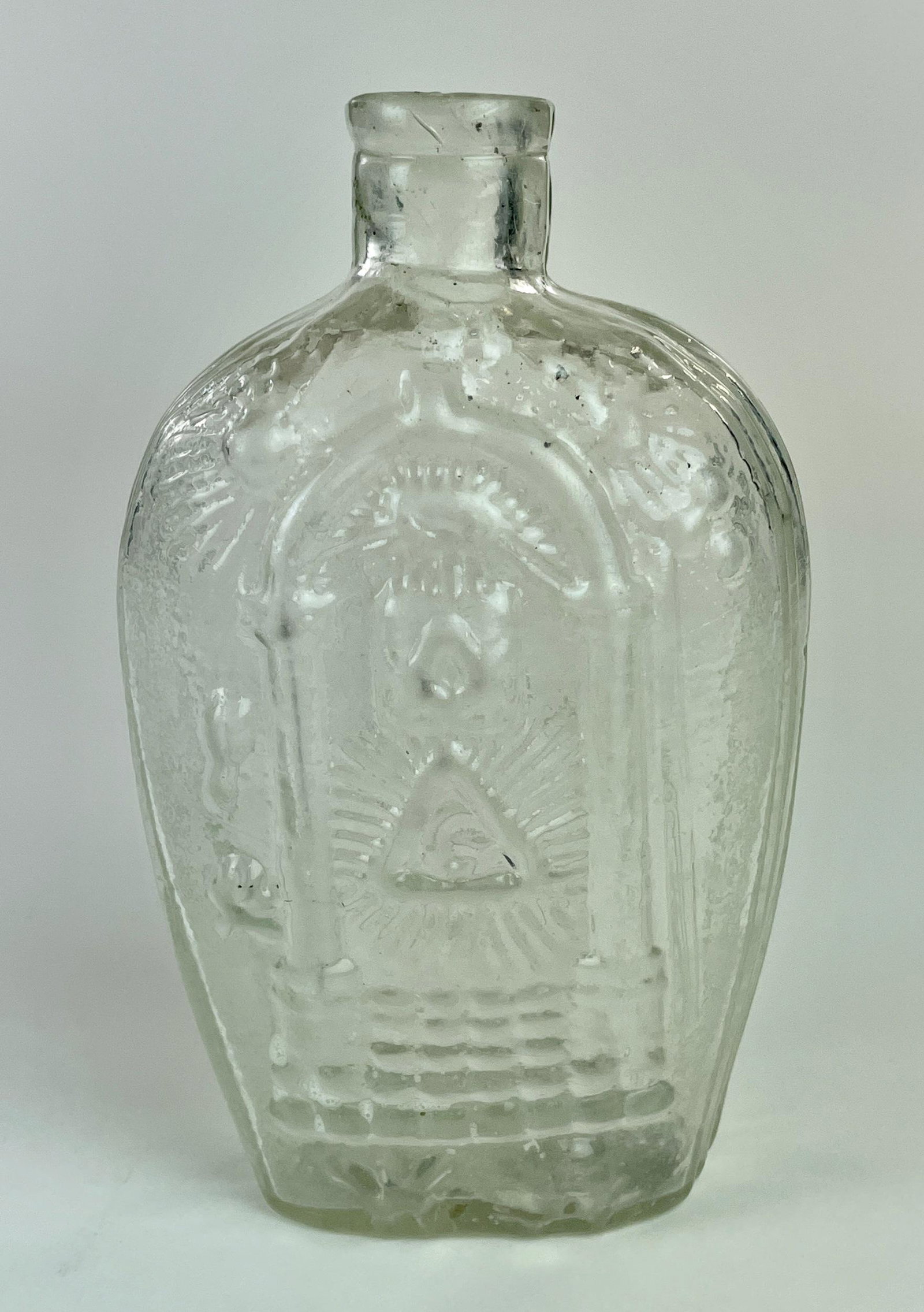 Rare GIV Masonic Eagle Flask: In "Early American Bottles & Flasks", GIV-3, in an unusual frosted tone, with eagle to one side and masonic imagry to the other. ht. 7.5"