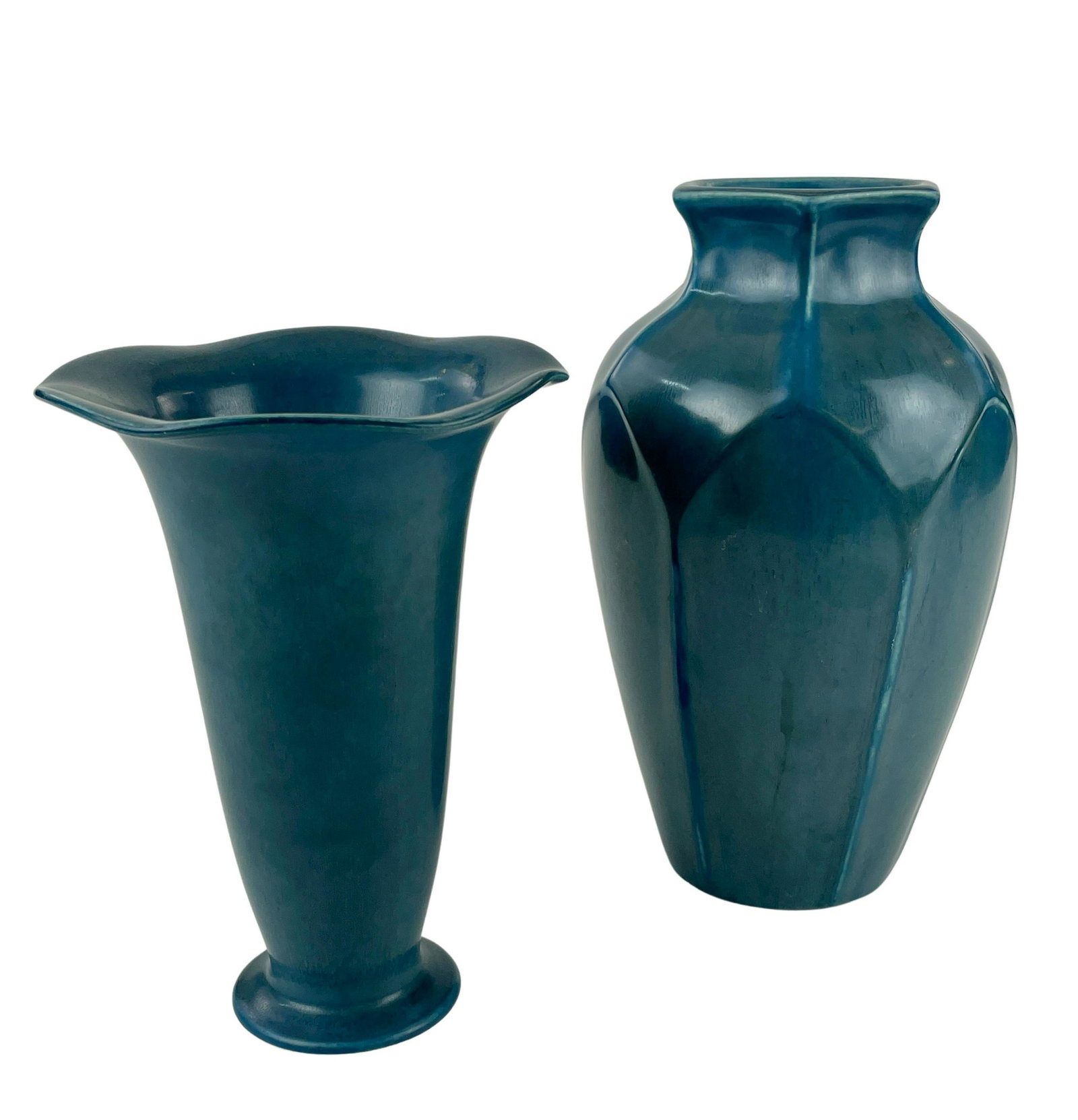 Pair of Rookwood Production Blue Vases: Including one lotus form example and another beaker vase, 1922 and 1924, respectively. Tallest ht. 10".