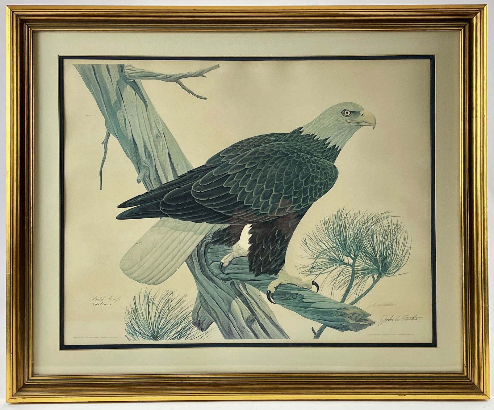 Pair of John Ruthven Signed and Numbered Lithographs: One depicting Wood Ducks and one depicting the American Bald Eagle, both signed in pencil. Largest framed size: 26" ht. x 32" wd