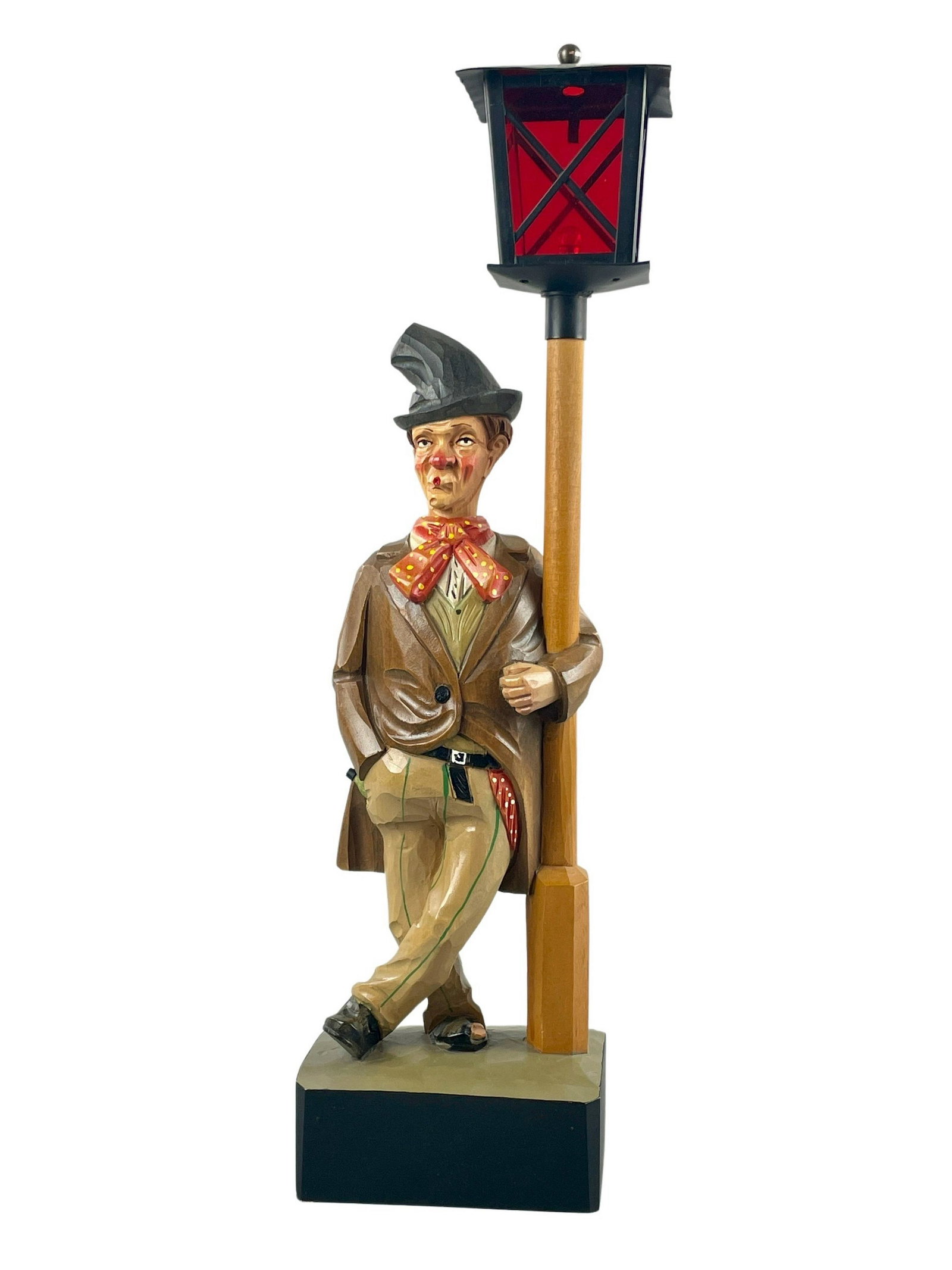 German Carved Wood Whistling Drunkard Automaton: Carved and handpainted automaton / music box stamped "Elsa Germany" to the base. A rosy-cheeked over-indulger clutches to a light post while a wine bottle peeks out from his pocket and a toe peeks out