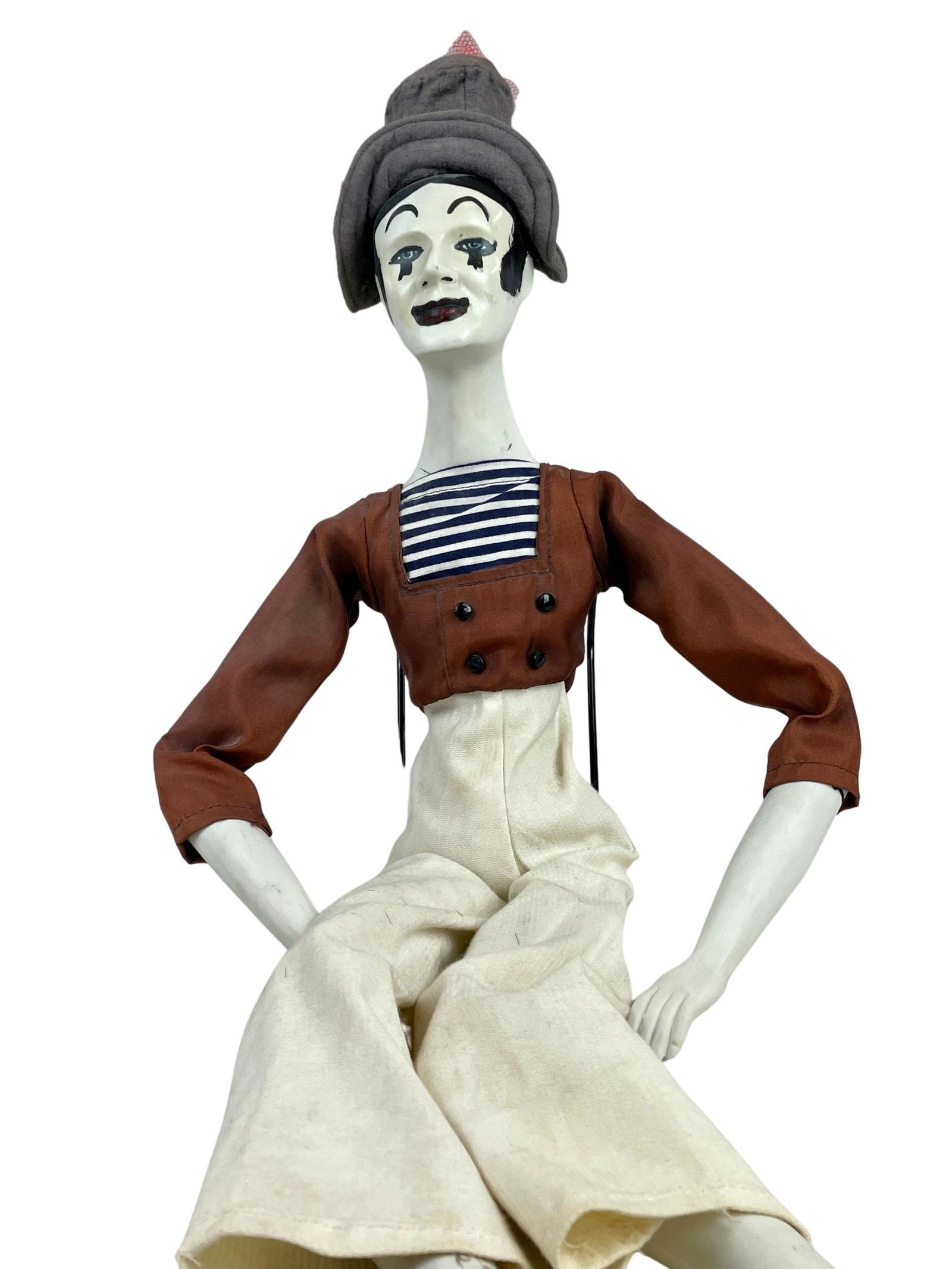 Bisque Clothed and Painted Clown: A tall bisque clown, marked to one leg, replete with clothing. Ht. 25.5". Property from the Estate of an Indian Hill, OH collec