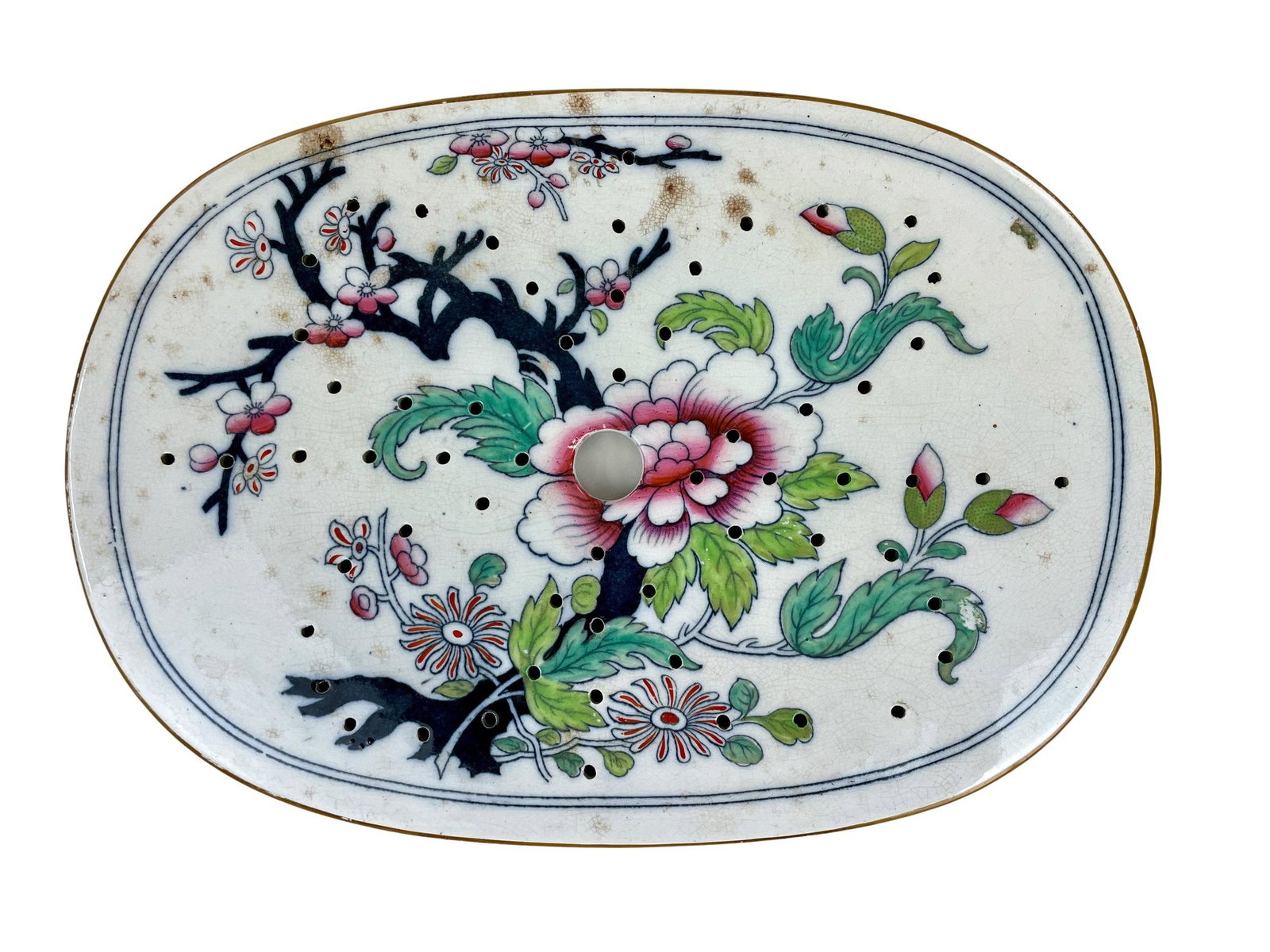 19th Century English Porcelain Trivet: 19th century, a pierced trivet, marked to underside. Lg. 13". From the estate and lifelong collection of William Garrett Hodges (1946