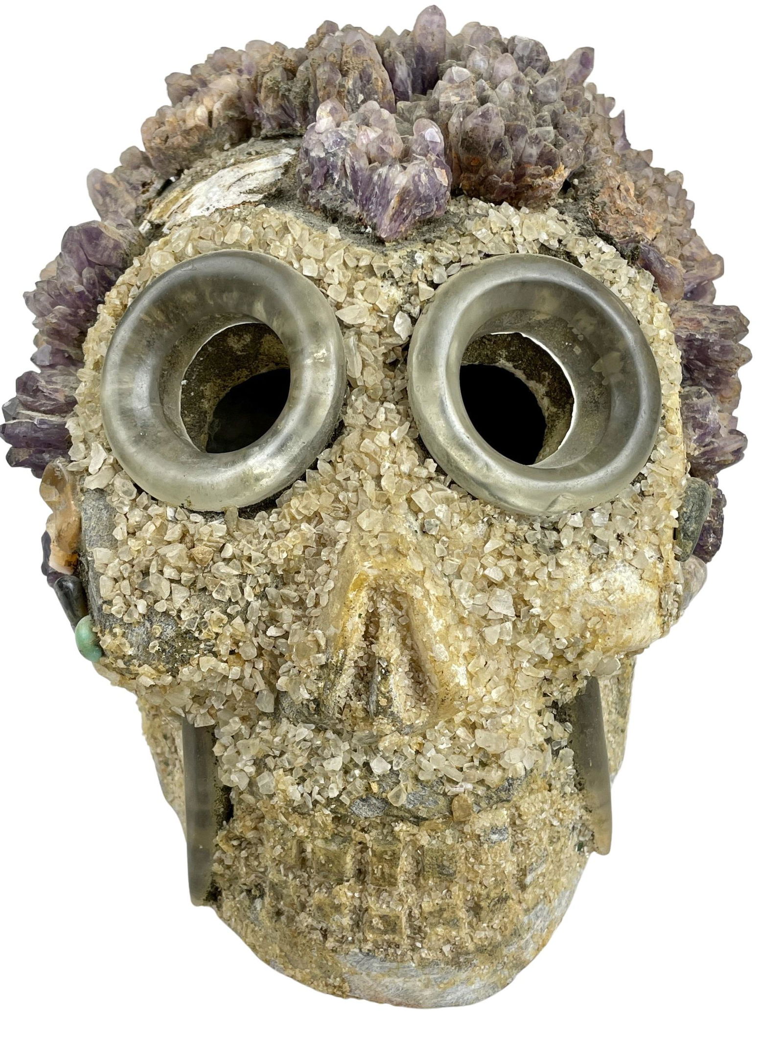 Stone Carved African Head with Amethyst Cluster Hair: Two round eyeholes consisting of resin, with amethyst cluster hair carved head. Height: 6.75"