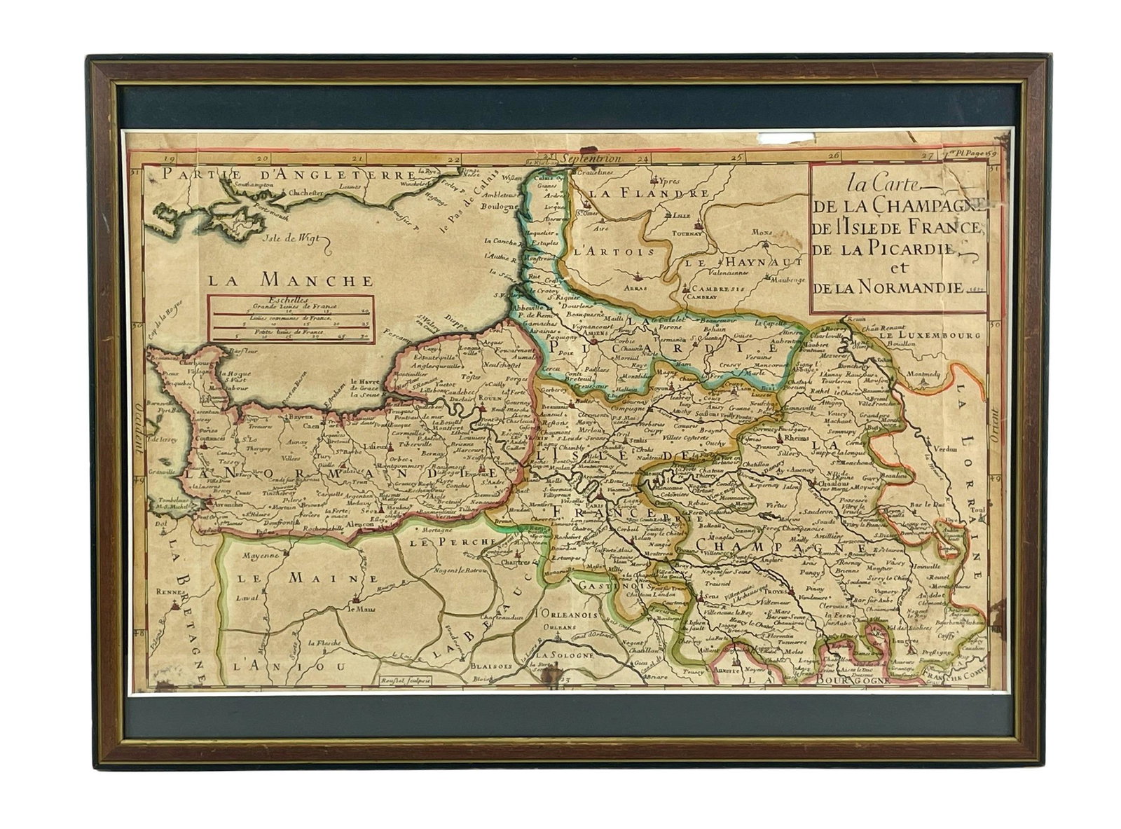Early Map of Champagne, France and Normandie: La Carte de la Champagne, de Isle de France, de la Picardie et de la Normandie. Hand colored, 19th century. Framed size: 12" ht. x 15.5" wd. From the lifelong collection of Edythe and Donald Aukerman,