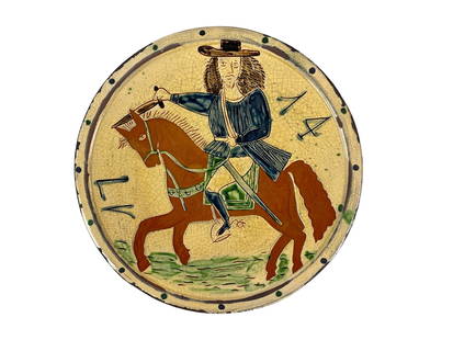 Chris Woods for Turtlecreek Pottery Charger: A fine decorative charger depicting rider with sword on horseback. Inscription to verso reads "From the Elmer R. Webster and Robert A. Titsch Folk Art collection, Dayton Art Institute, November 17, 19