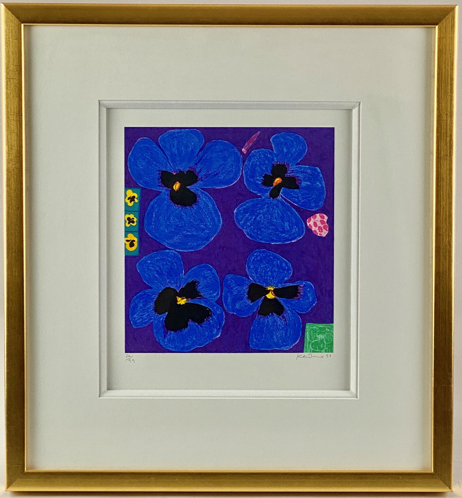 Ken Done Color Floral Lithograph: Numbered 22/99, and dated 1993. Signed by artist to the lower margin in pencil. Brightly colored blue and purple florals, housed in a nice gilt frame with mat. Sight size: 10.75" ht. x 10" wd., framed