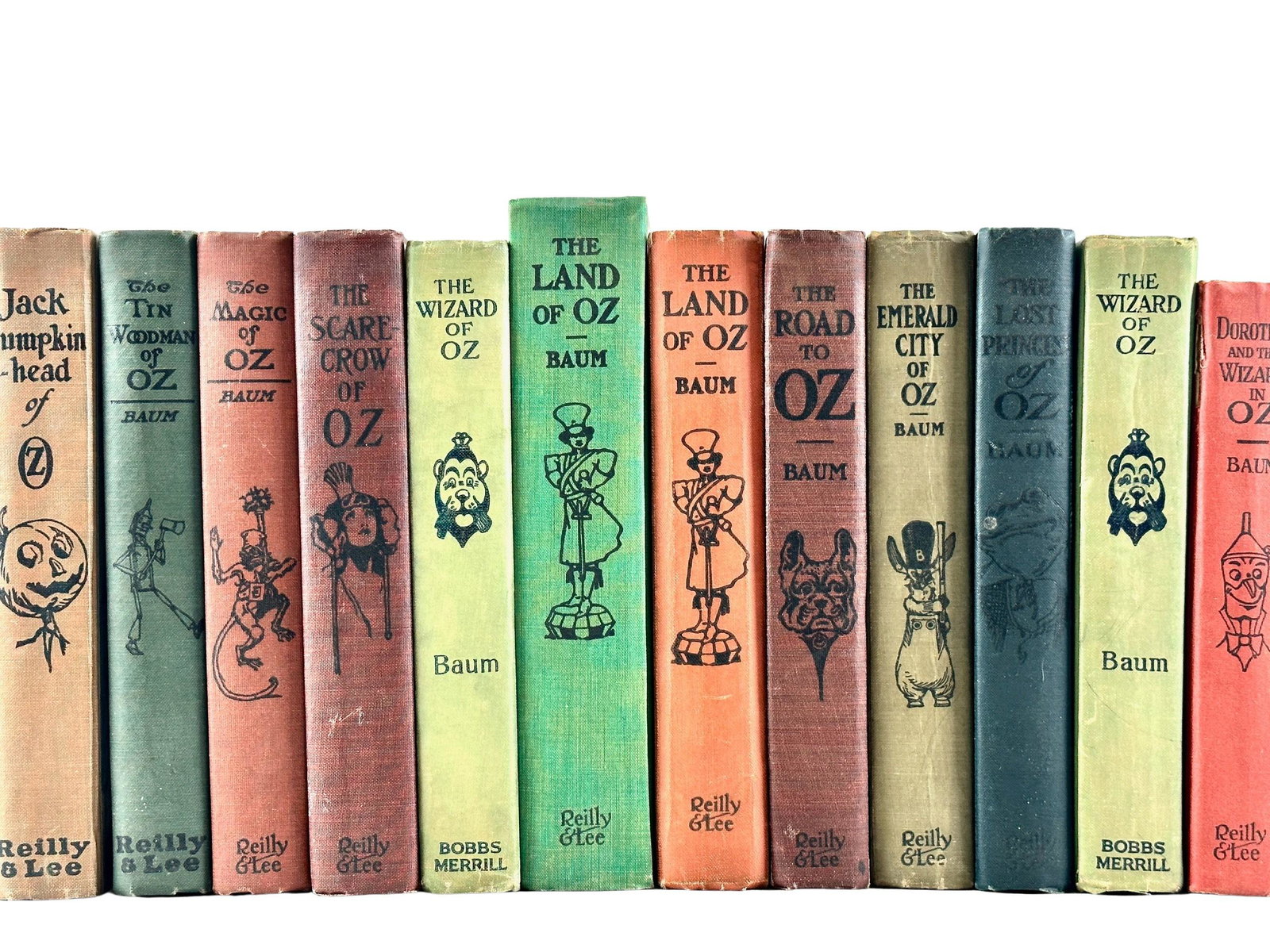 The Wizard of Oz, 12 Volumes: Titltes include: The Princess of Oz, The Wizard of Oz, The Land of Oz (two copies), Tin Woodman of OZ, The Magic of Oz, Dorothy and the Wizard of Oz, The Scary Crow of Oz, The Wizard of Oz, The Road t