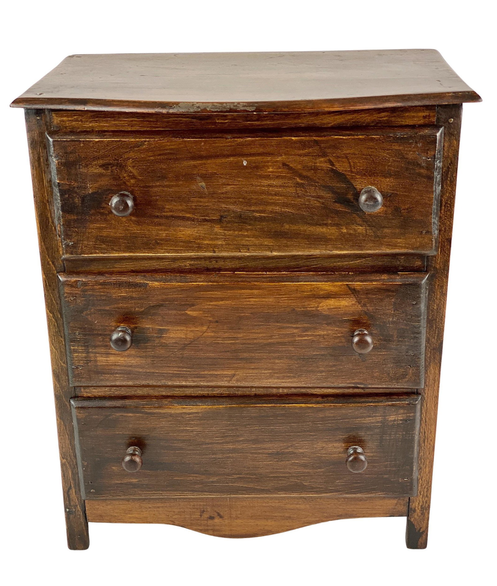 Miniature Chest of Drawers: American, early 20th century. A miniature chest of drawers, with tapering skirt. 15.5" ht., 12" wd. 8" dp.