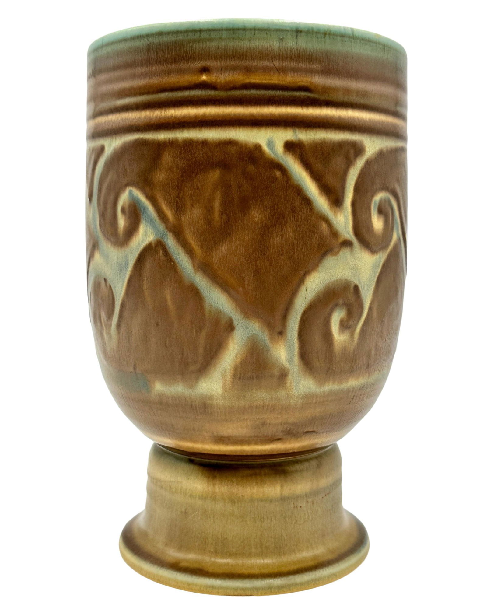 Elizabeth Barrett, Rookwood Pottery: 1927. A mat glaze, footed vase with a modern design of leaves and flowers. Shape number 6013, signed, dated and marked to underside. Ht. 8.5".