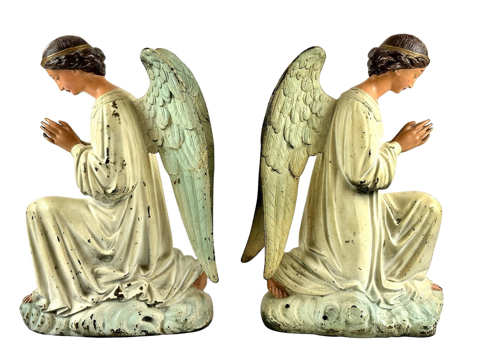 Pair of Cast Iron Polychrome Angels: A pair of early 20th century doorstops, each with downward facing angels, polychrome painted. Each ht. 14".