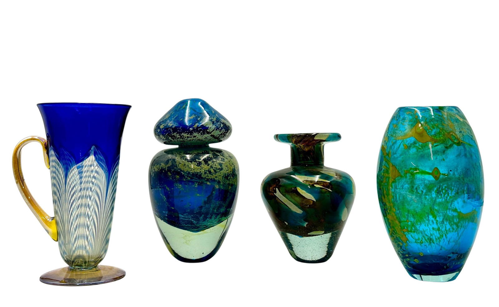 Group of Four Unsigned Art Glass Pieces: One mushroom style, one chalice/cup, one blue vase and one single flower vase. Tallest is 7" ht.