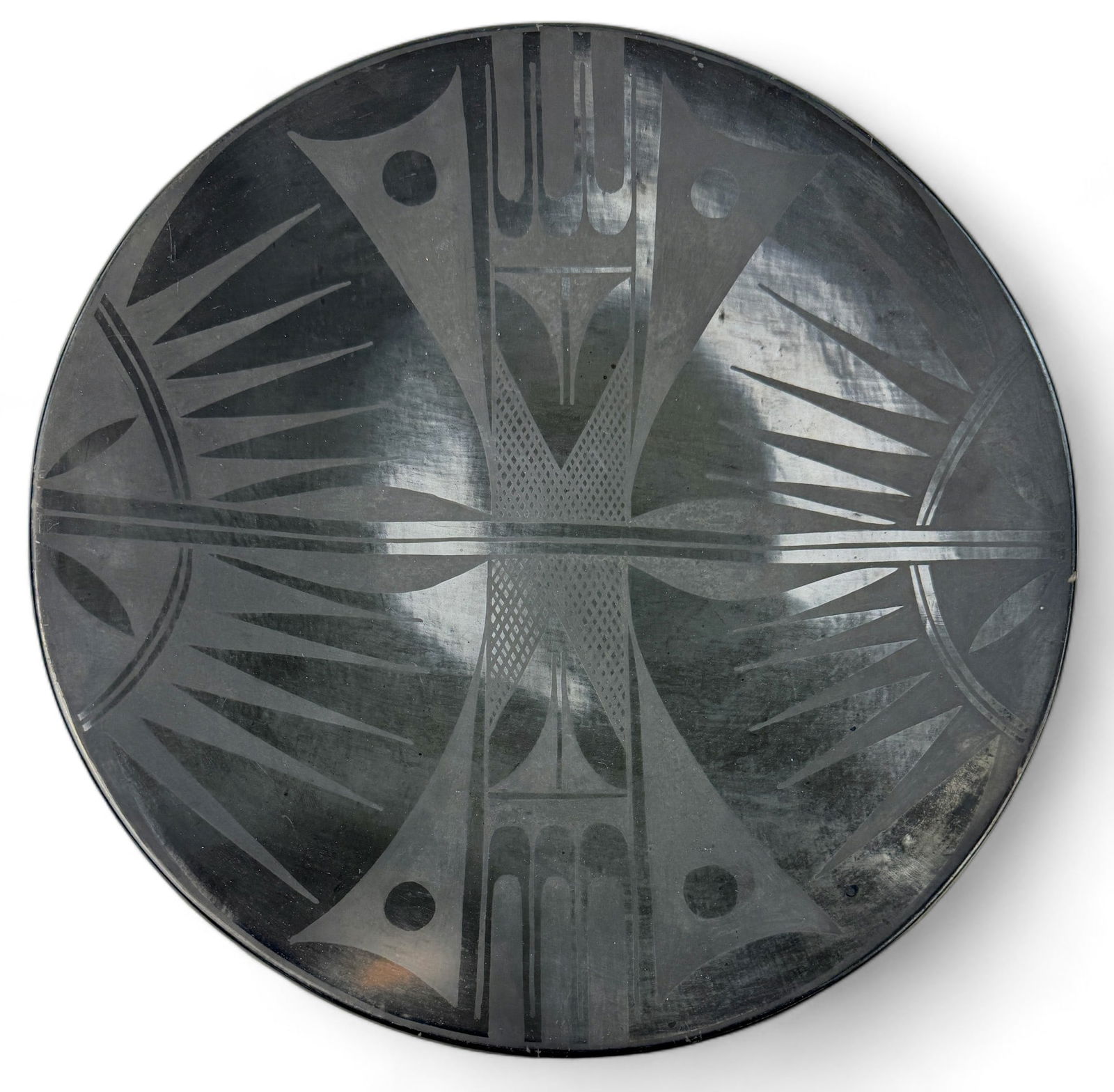Tonita Roybal Blackware Charger: A Tonita Roybal (1892-1945) blackware charger, signed to underside. Diameter 11.5".