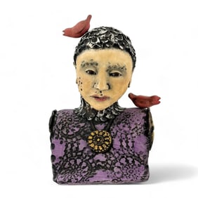 Ceramic Sculpture of a Woman with Cardinals