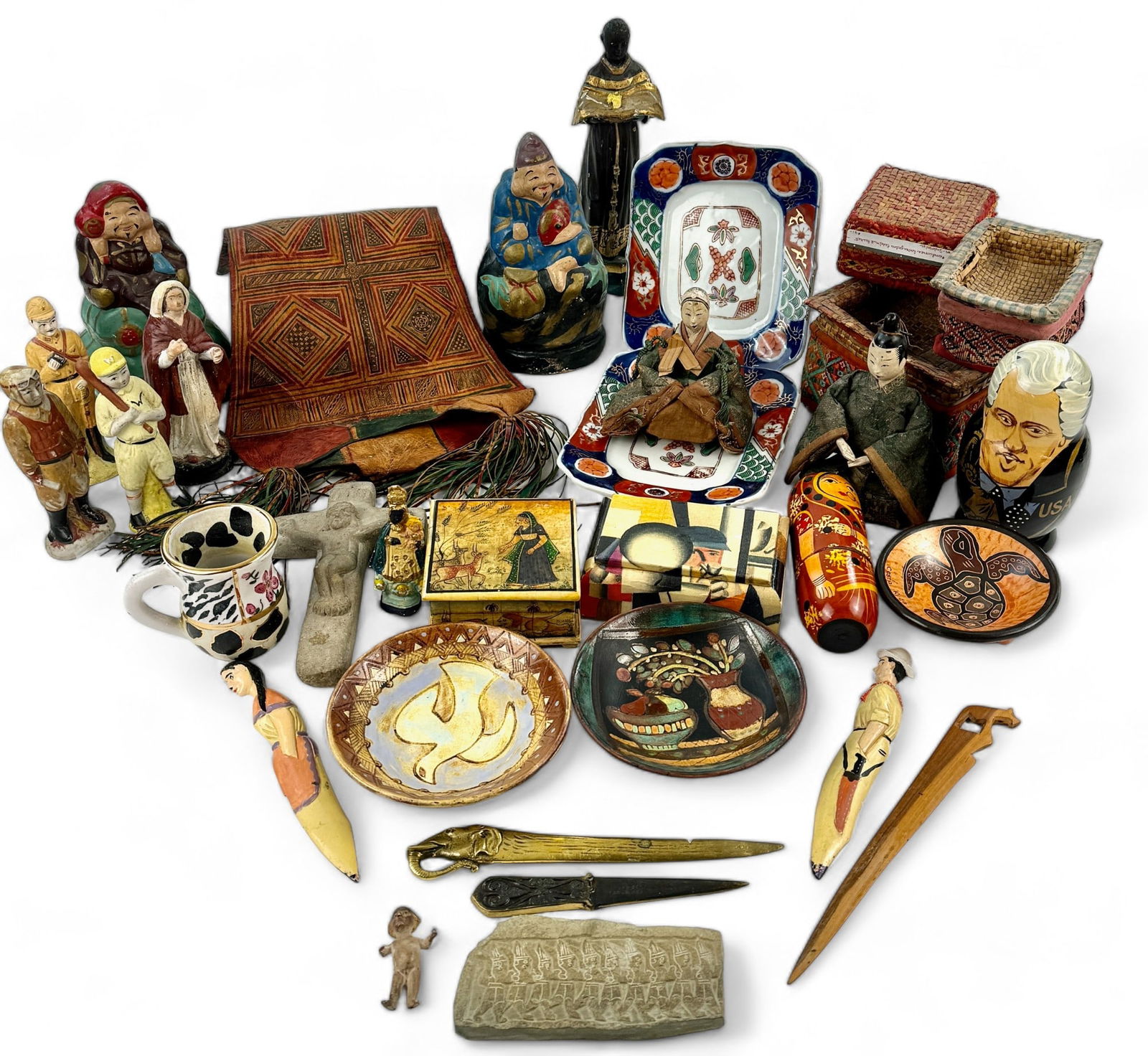 Large Collection of Tourist Items: A large collection of 20th century tourist objects, including Japanese dolls, ceramic figures, baskets, nesting dolls, boxes, and other items. From the collectio