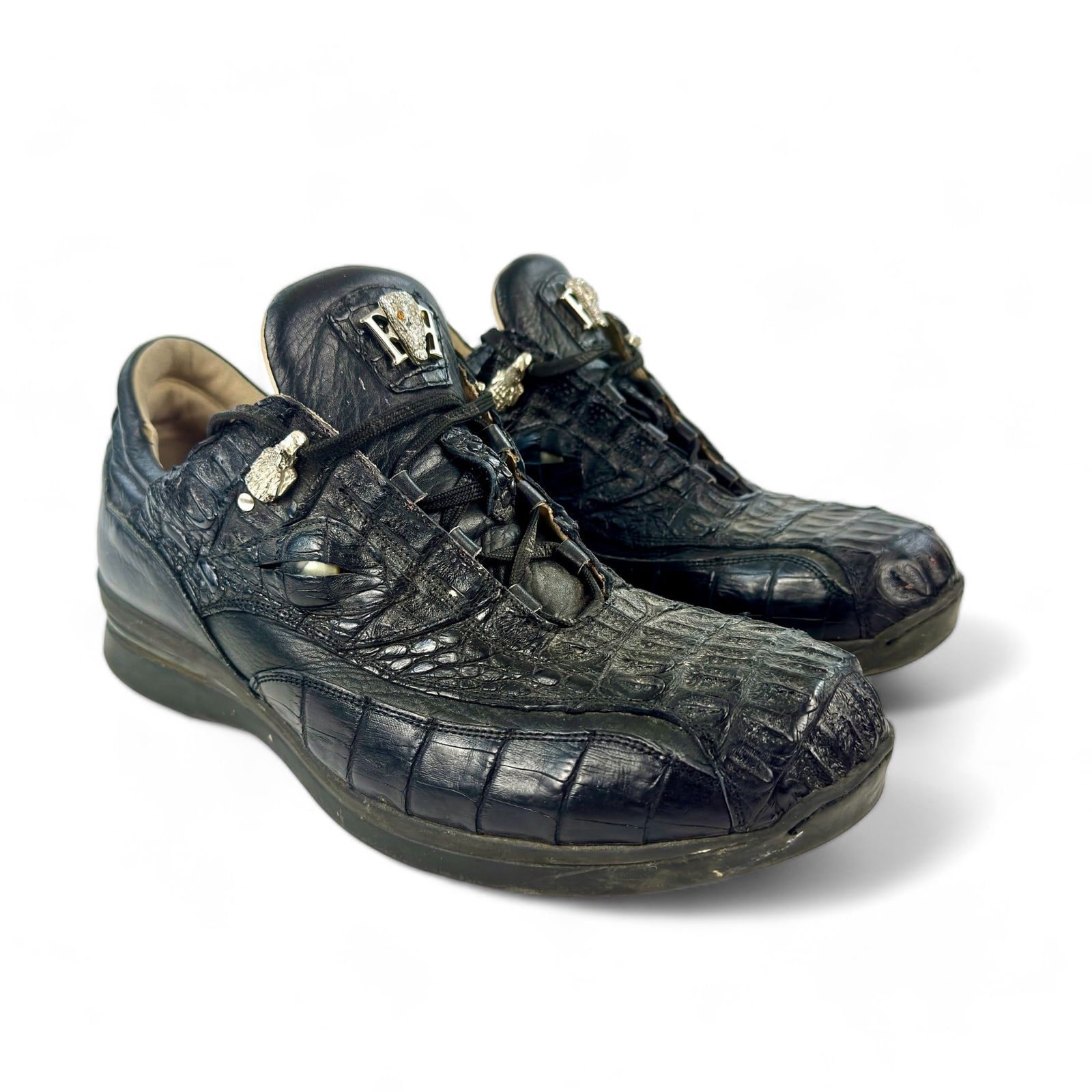 Pair of Fennix Sneakers: Fennix leather sneakers with bejeweled tongue, marked to underside. Size approximately 13.