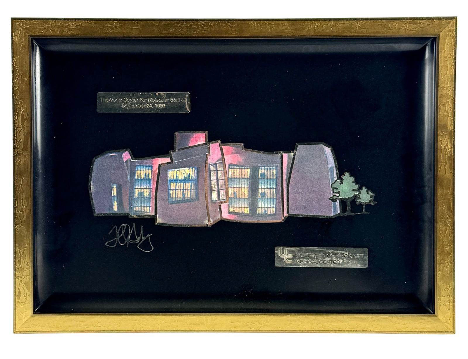 Commemorative Frame for Vontz Center, Architect Frank Gehry: A framed plaque commemorating the completion of the Vontz Center at the Cincinnati UC Medical Center, which was designed by Frank Gehry. 13.5" x 19.5" (framed).