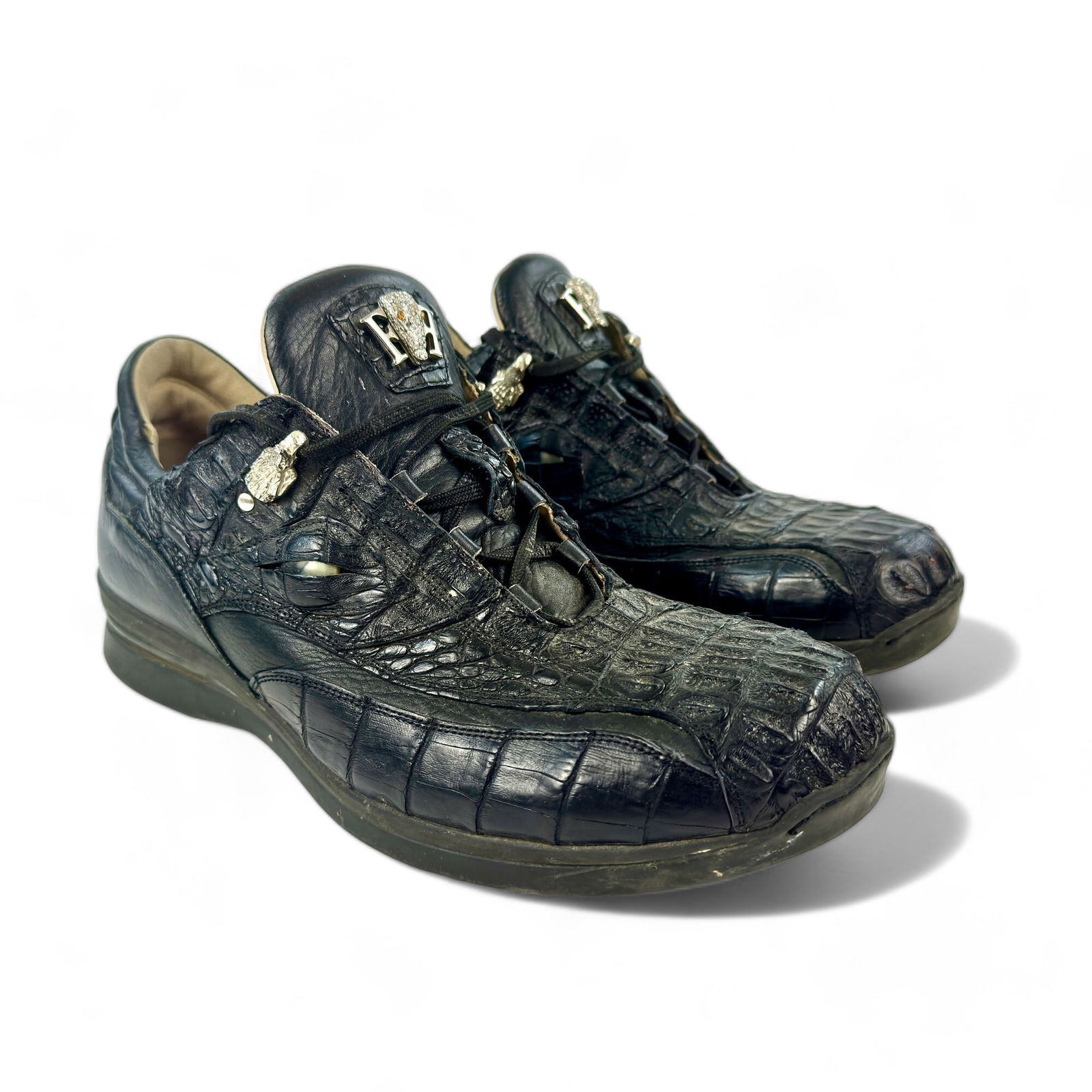 Pair of Fennix Sneakers: Fennix leather sneakers with bejeweled tongue, marked to underside. Size approximately 13.