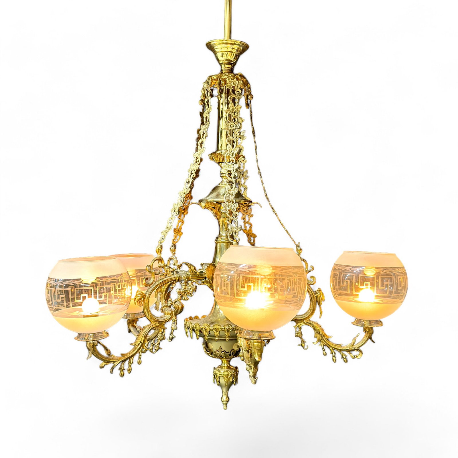 Rare 1868 Cornelius and Baker Gasolier: American Gasolier by Cornelius and Baker, Philadelphia, PA Ca. 1868 Five arm design, brass and bronze with intricate floral and leafwork design cascading to each arm. High quality reproduction glass s