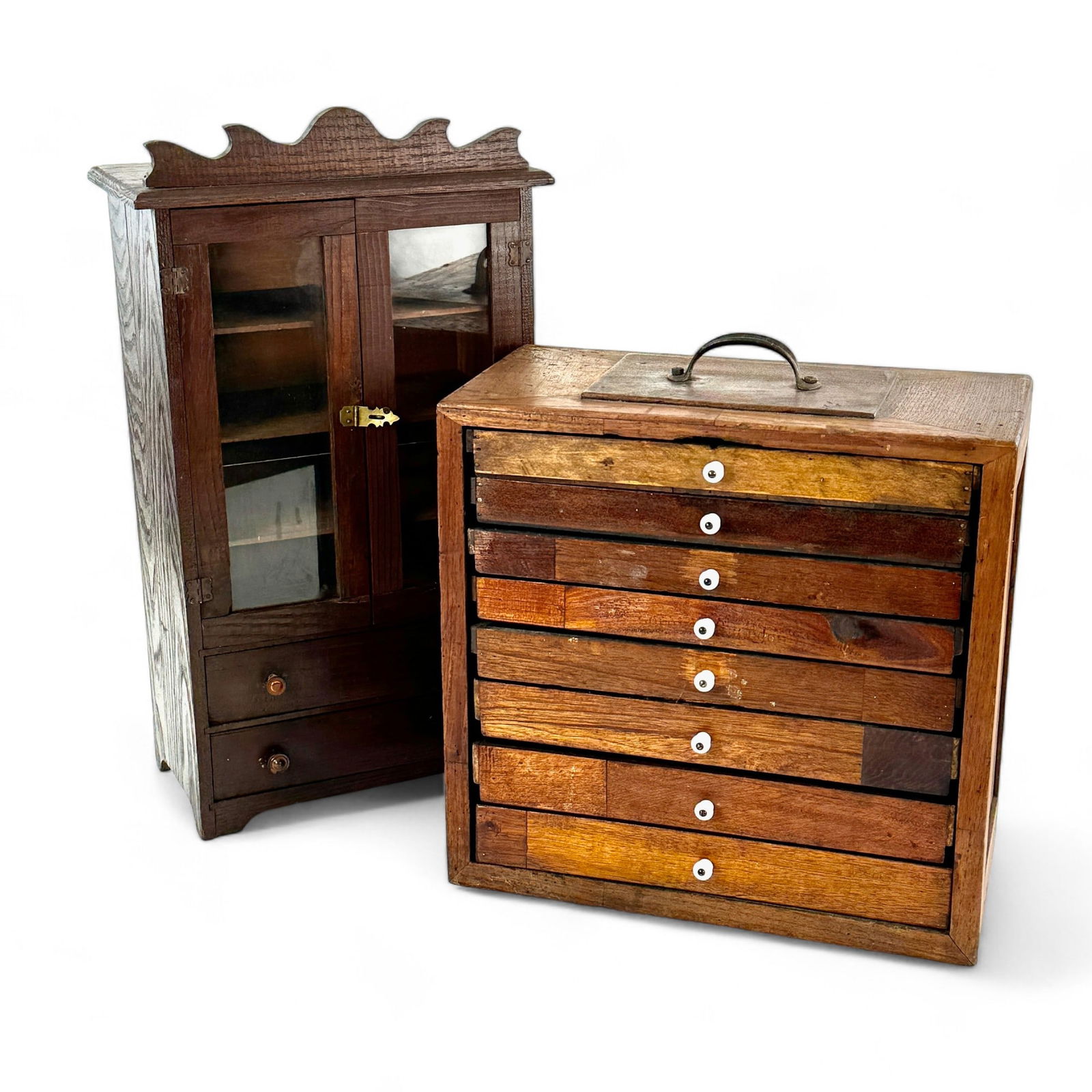 Pair of Cabinets, Spool and Miniature: Including a small spool cabinet with porcelain pulls, and a miniature display example. Tallest ht. 22".