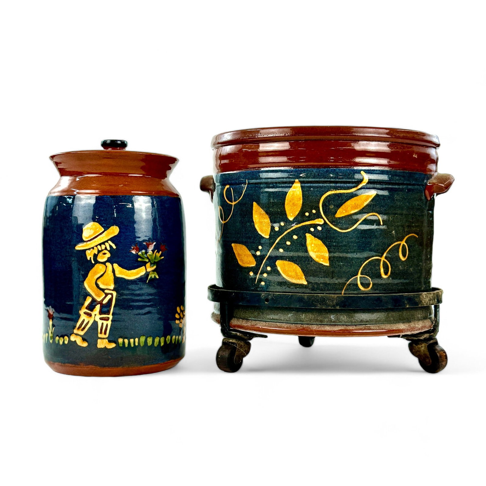 Pair of Turtlecreek Pottery Examples, One Greg Schooner: Including a planter with iron base, and a covered vessel. Tallest ht. 11".