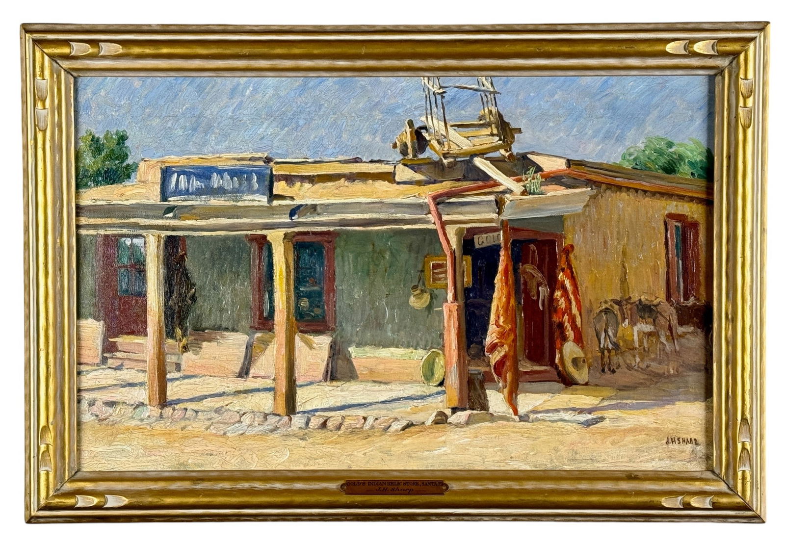 "Gold's Indian Relic Store" by Joseph Henry Sharp: Gold's Indian Relic Store, Santa Fe, NMOil on canvasSigned l.r. With a stamp to verso stretcher "Personal Property of J.H. Sharp"15" x 23.5" (sight)19" x 27" (framed). While the title, "Gold's Ind