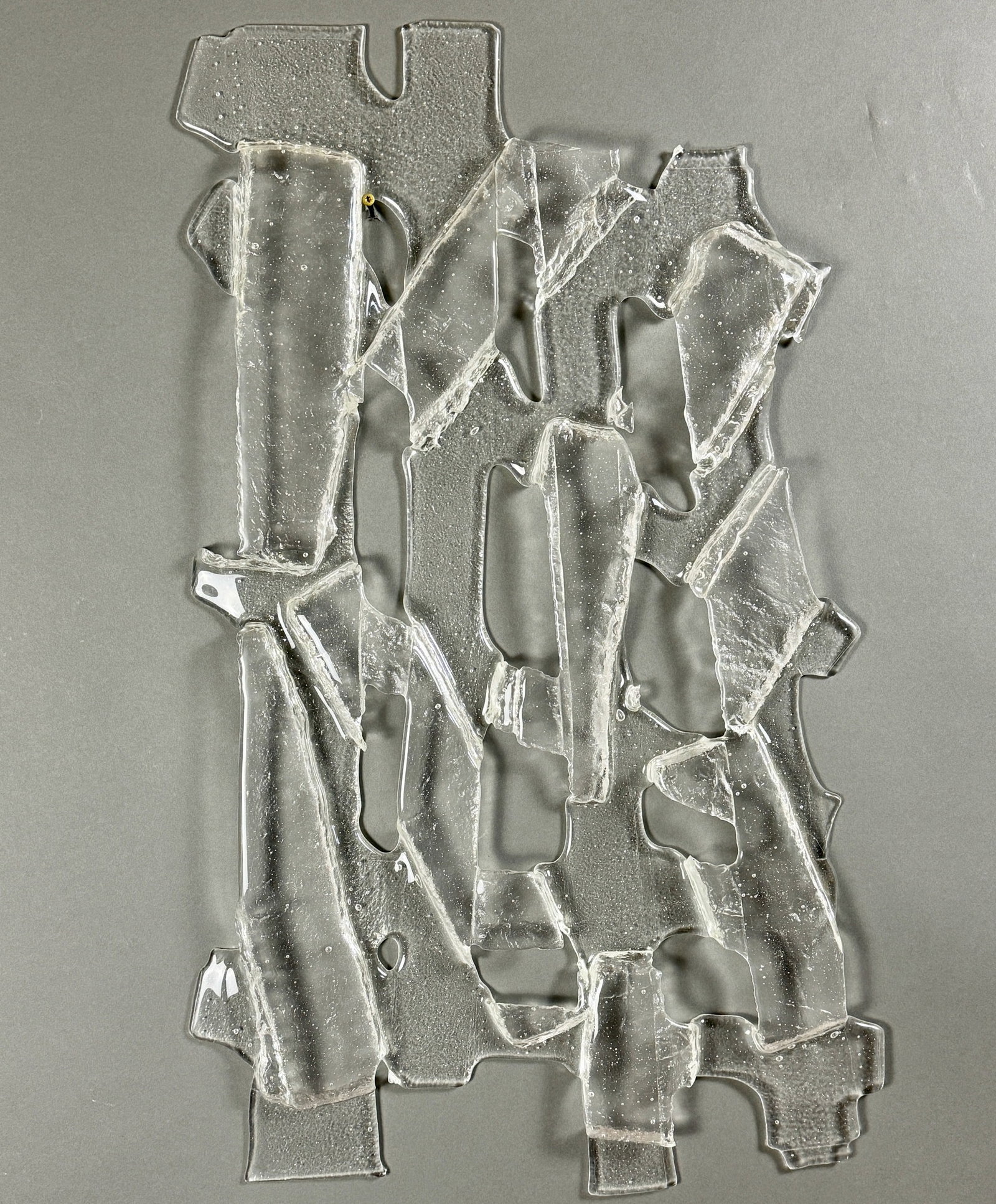 Sculptural Art Glass Wall Hanging: In clear glass. 21" ht. x 35" wd.