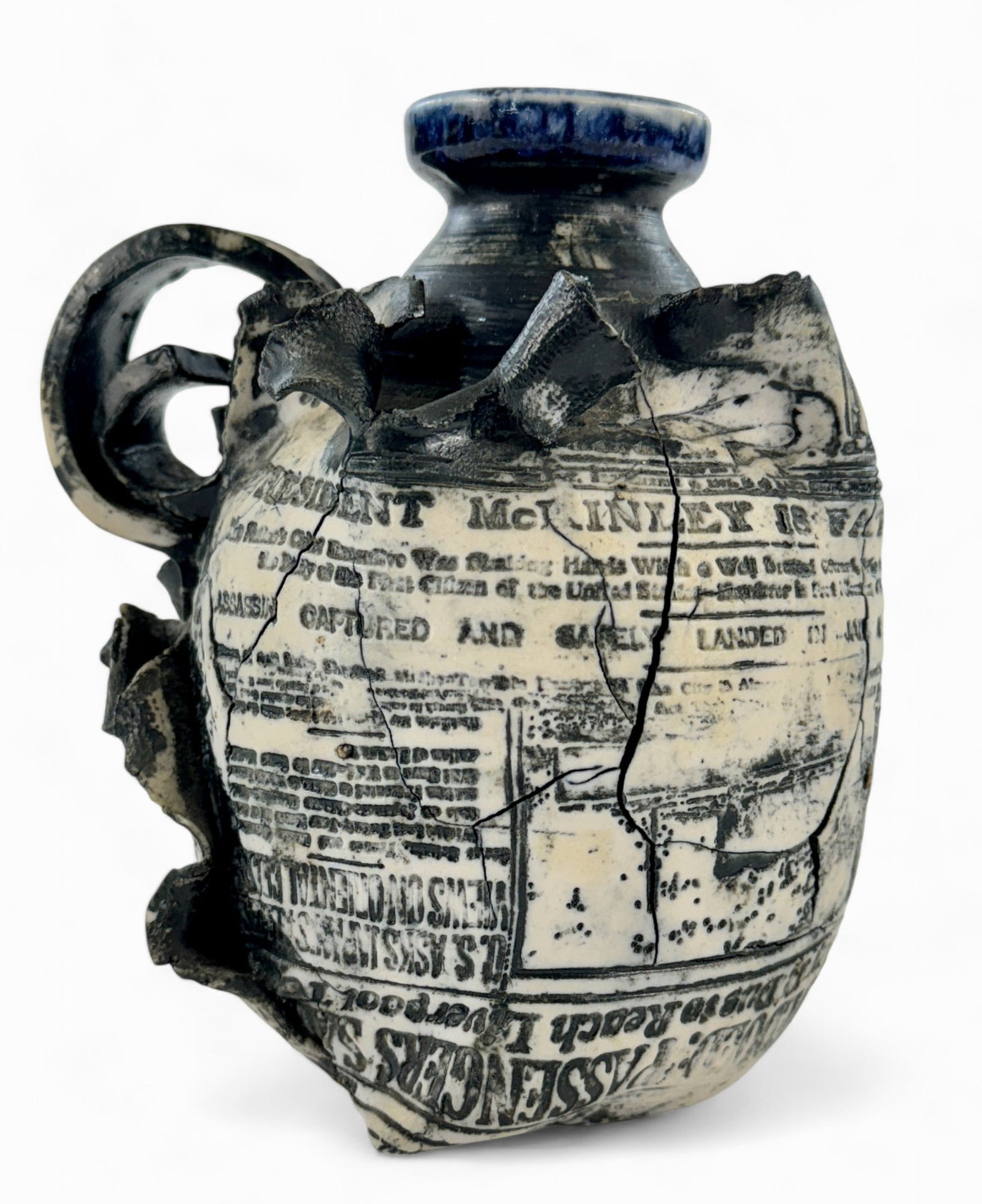 Ron Krough Lusitania Newspaper Jug: Stoneware jug with newspaper appearing applied relief, related to the Lusitania, signed to the underside. Ht. 6.5".