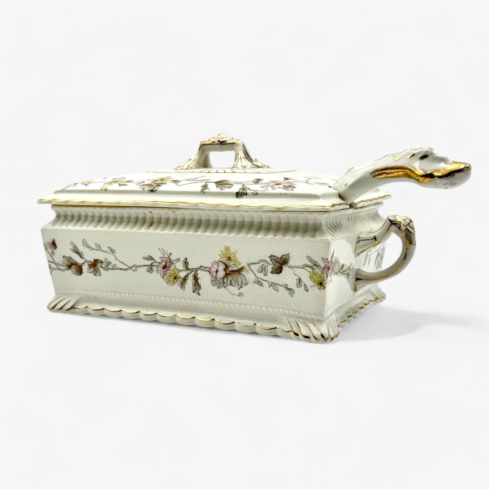 Handpainted Porcelain Tureen: In rectangular form, with ladle. Marked to base but mark has been worn heavily and is indecipherable, Handpainted with floral design. Height: 6.5", width: 12", depth: 7"