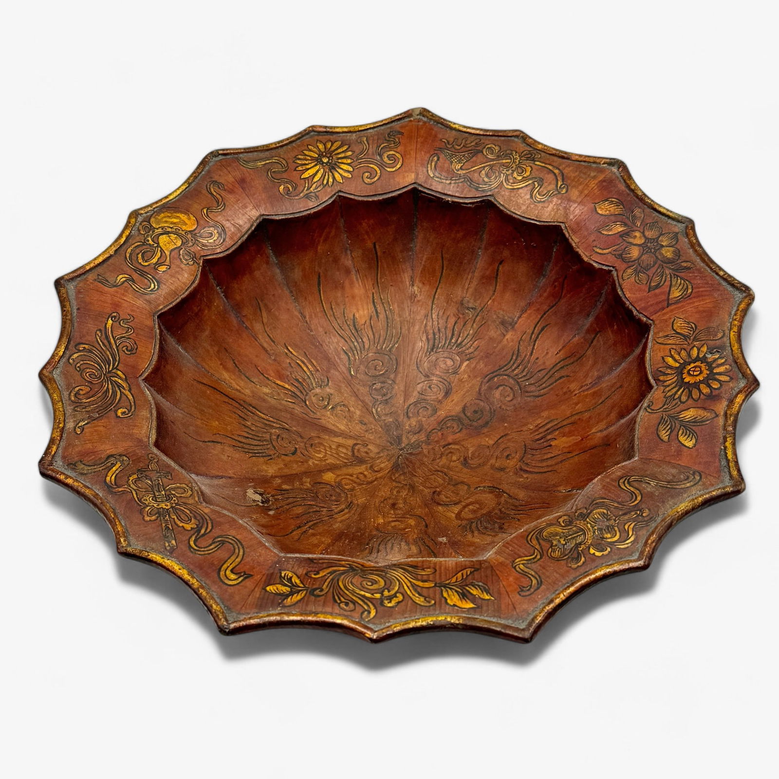 Pine Handpainted Early Bowl: In stained pine, handpainted with motifs of florals and chalices, unmarked. Pie crust lip. Diameter: 14"