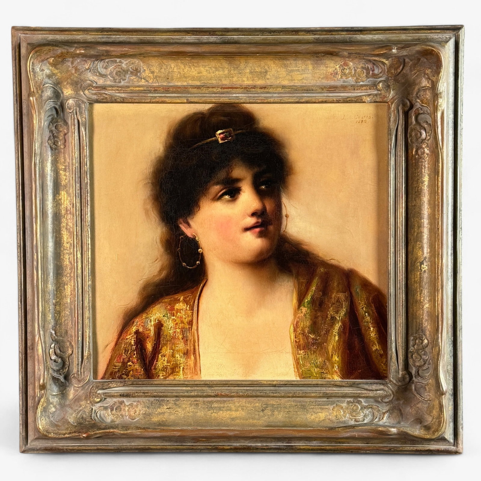 Neoclassical Portrait of Woman by J.M. Coates: J.M. Coates (19th century). Oil on canvas, signed and dated 1893 u.r., depicting a classical figure at half length with jeweled headband. 16" x 17.5" (sight), Housed in an art nouveau giltwood frame. 
