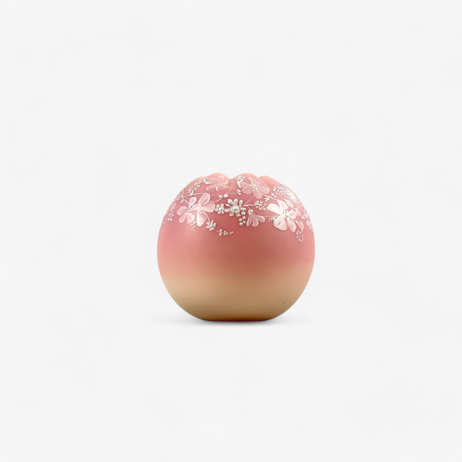 Webb Glass Miniature Vase: The cream-colored base folds into the pink upper portion, with painted florals in white to the upper portion in the round. Height: 3"