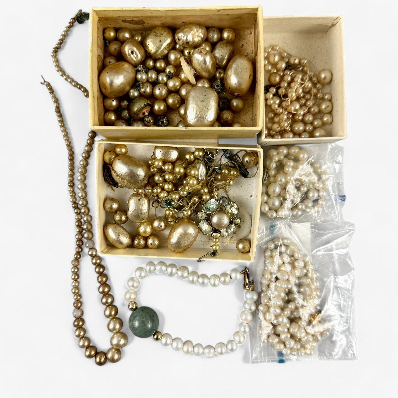 Pearl Necklaces and Loose Pearls: Including 5 pearl necklaces and bracelets, with one bracelet with jadeite bead, and then a host of loose faux pearls.